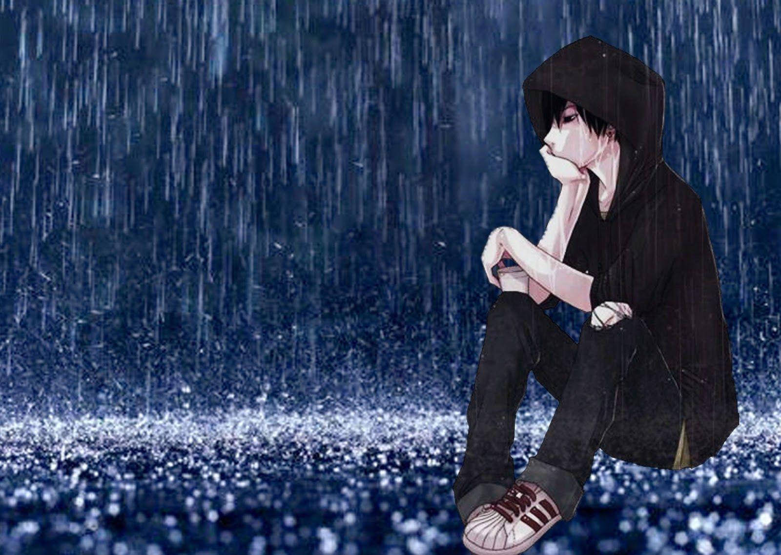 emo 桌布 壁紙 — 一個孤獨的動漫少年穿著黑色連帽衫，在傾盆大雨中沉思地坐著，周圍是閃閃發光的藍色水。