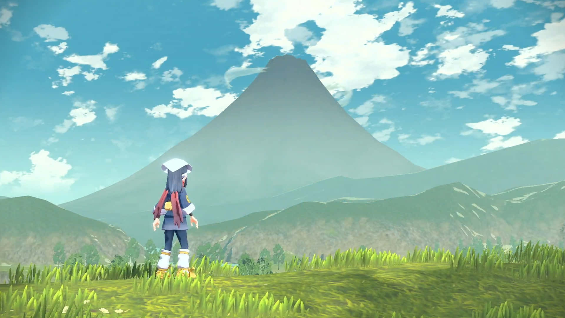 Pokemon Virtual World 桌布 壁紙 — 一個孤獨的動漫角色站在草地上，仰望在明亮藍天和蓬鬆雲朵下的一座高聳霧濛濛的山。