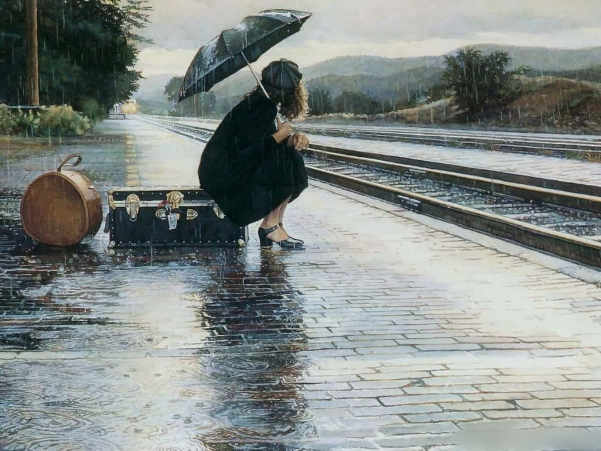 Raining 桌布 壁紙 — 一個孤獨的女人穿著黑色外套，在黑色雨傘下蹲在濕漉漉的火車月台上的行李箱旁邊。