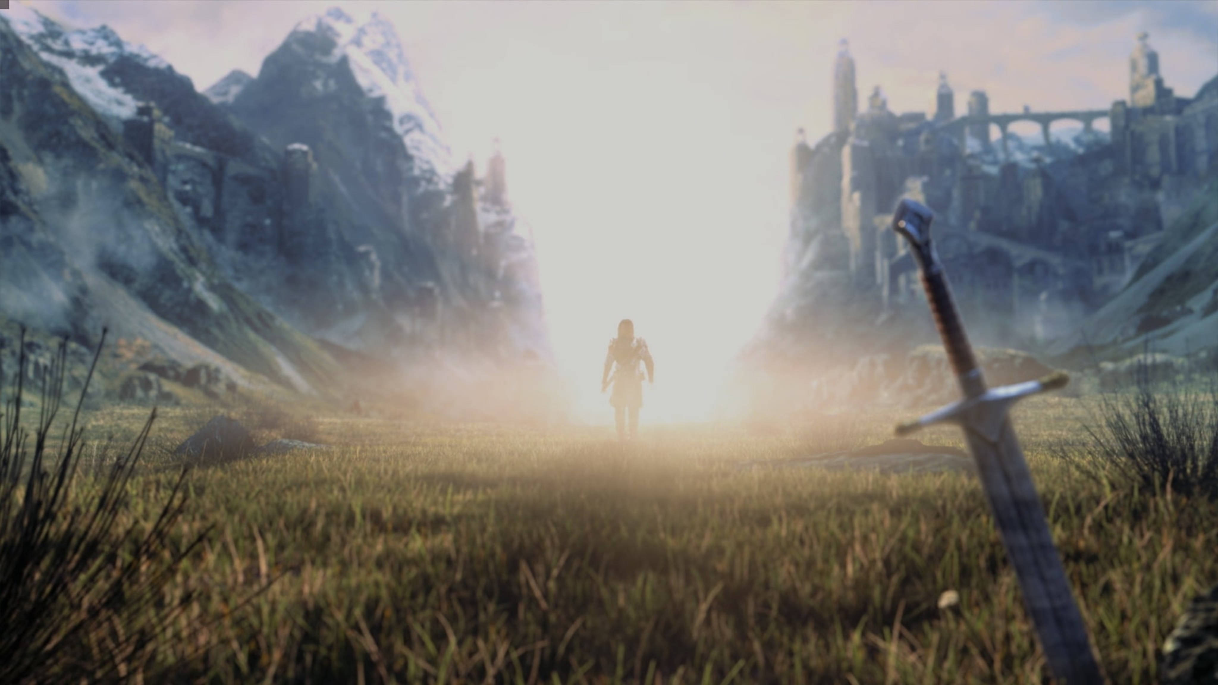 middle earth shadow of war 桌布 壁紙 — 一個孤獨的戰士走向雪山之間的一道光芒，前景草地上插著一把劍。