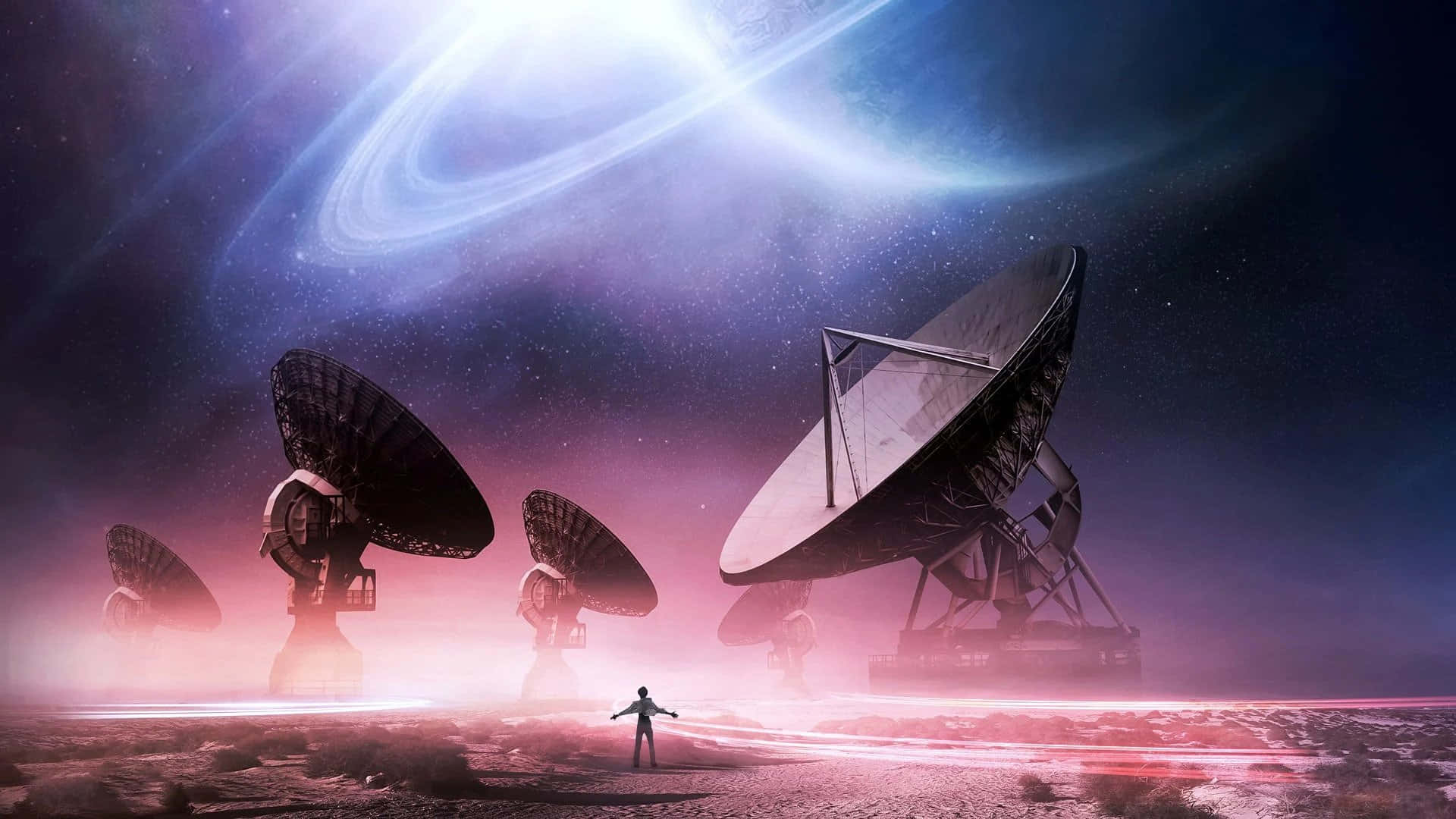 Space Exploration 桌布 壁紙 — 一個孤獨的身影站在巨大的衛星天線前，下方是發光的環狀行星，呈現宇宙景觀。