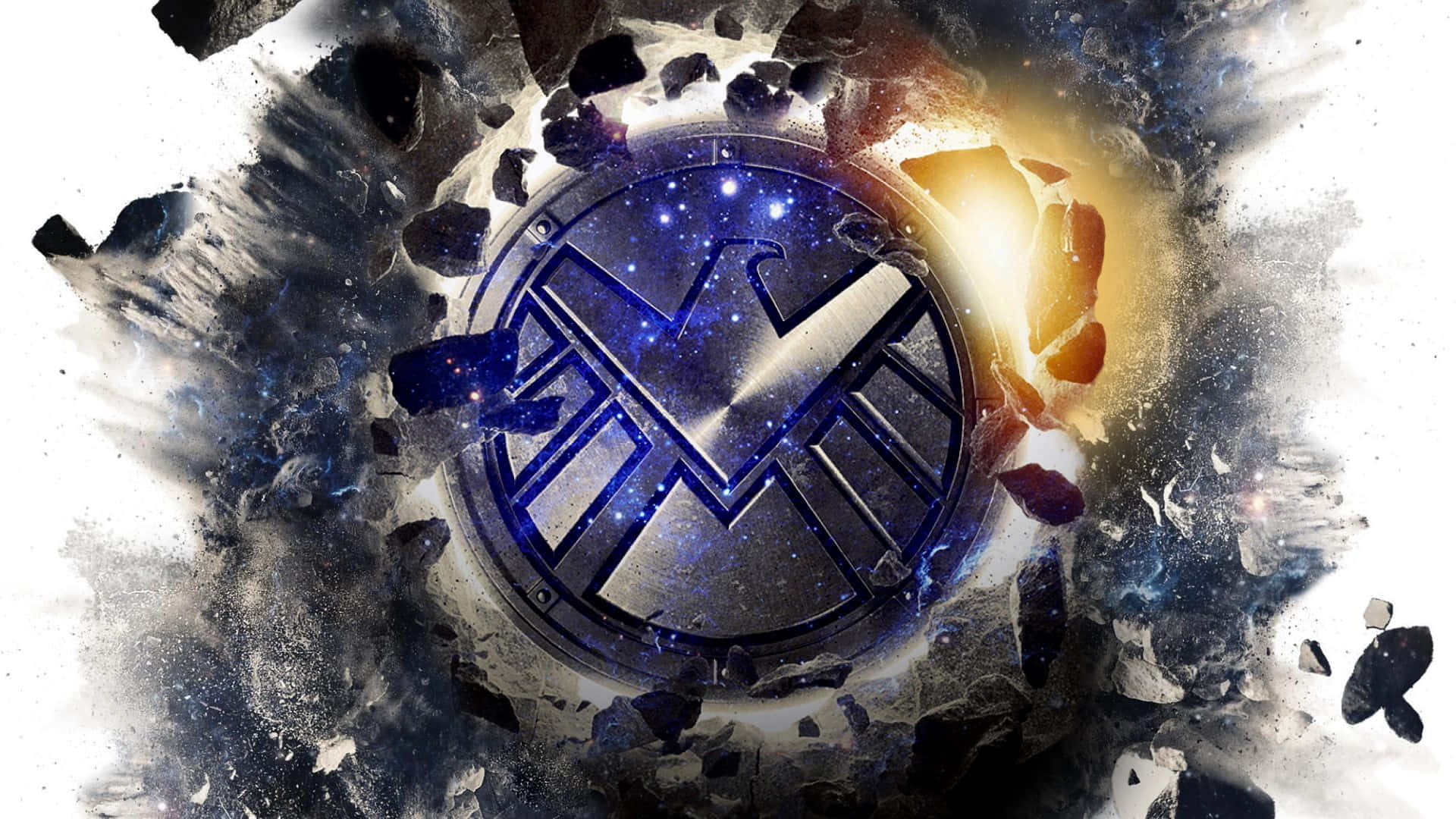 shield 桌布 壁紙 — 一個宇宙S.H.I.E.L.D.標誌穿過破碎的岩石，帶有星場和熾熱的光芒。