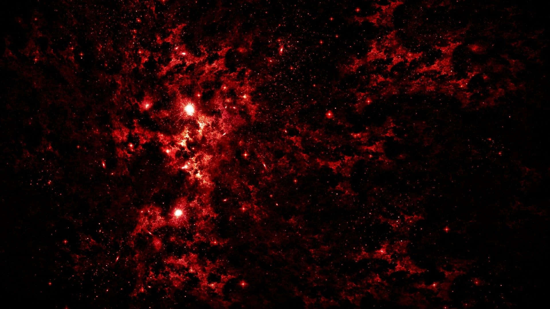 Red Space 桌布 壁紙 — 一個宇宙星雲，在深邃的黑色虛空中散發著火紅色的氣體和散落的明亮星星。
