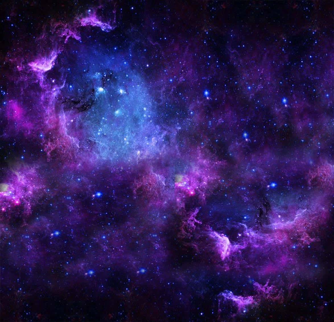 Beautiful Space 桌布 壁紙 — 一個宇宙星雲在佈滿星辰的黑暗虛空中旋轉，呈現出鮮豔的紫色和藍色雲團。