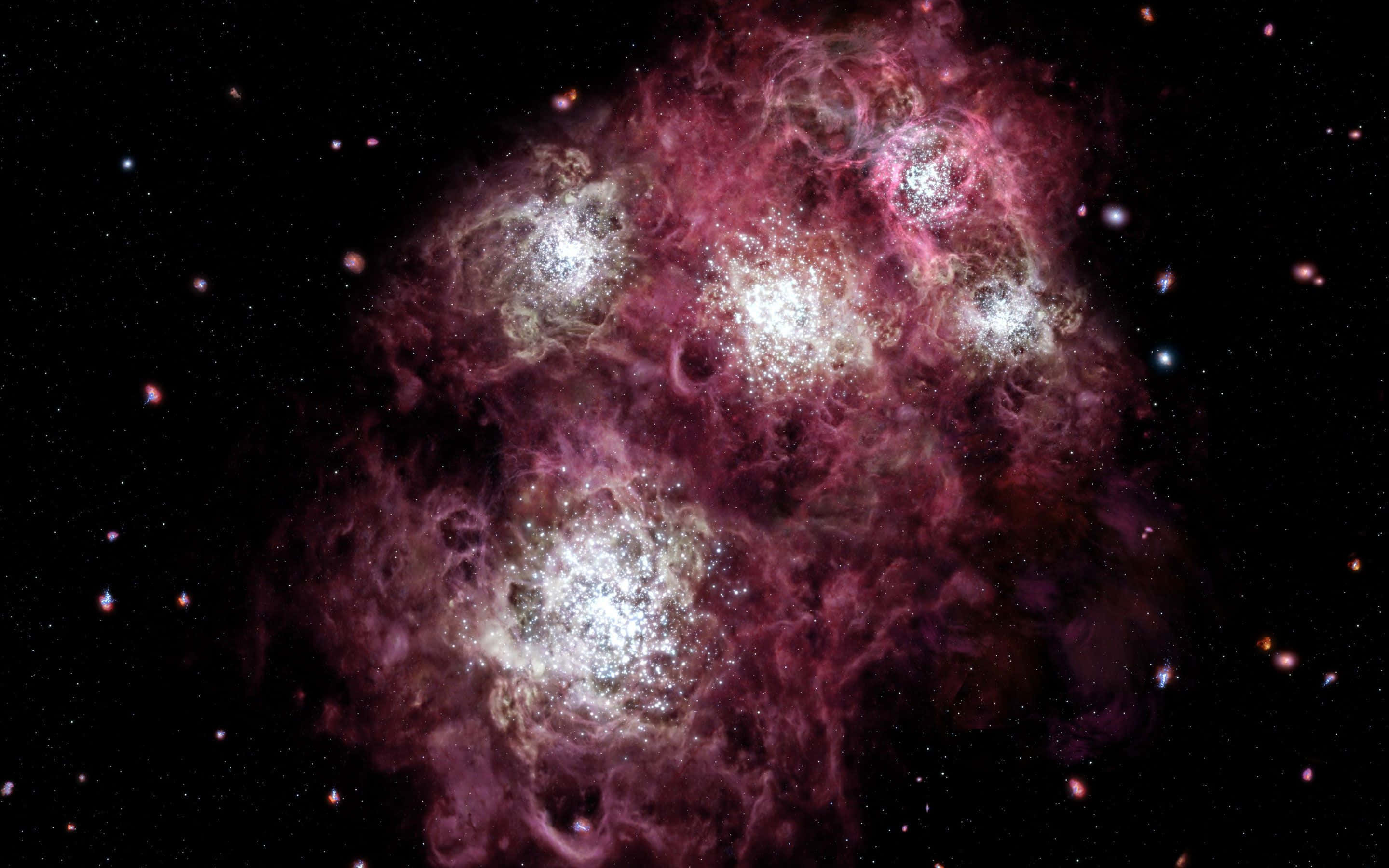 Pink Galaxy 桌布 壁紙 — 一個宇宙星雲在星空背景下旋轉，帶有充滿活力的洋紅色和發光的白色星星。