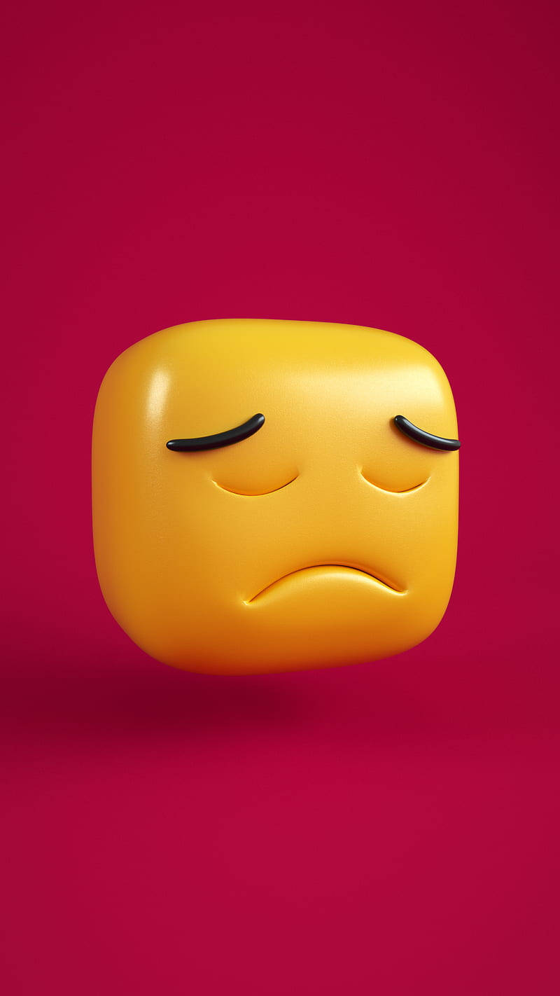 emoji 桌布 壁紙 — 一個帶有光澤的黃色悲傷表情符號，閉著眼睛，漂浮在充滿活力的洋紅色背景上。
