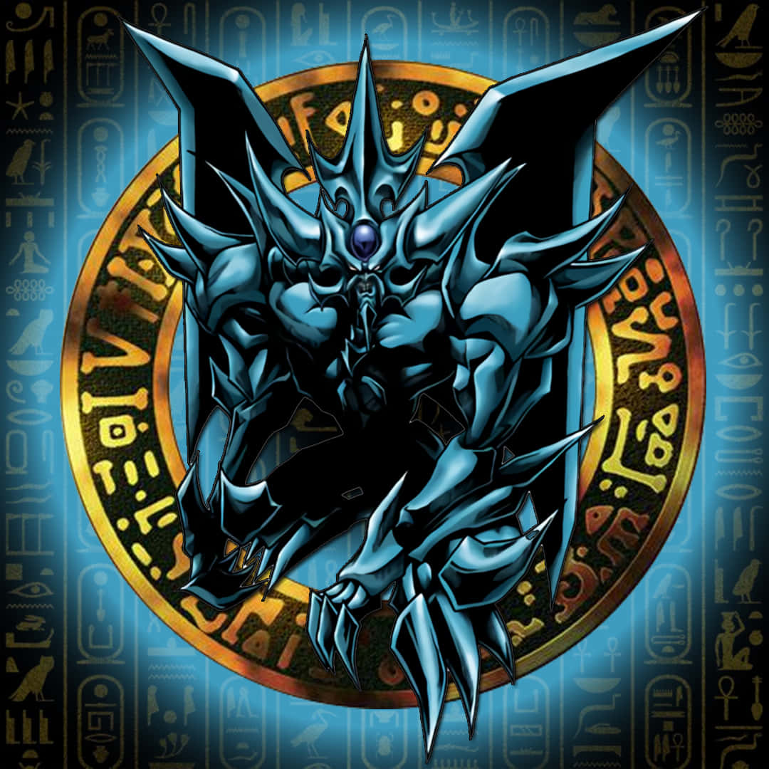 Obelisk The Tormentor 桌布 壁紙 — 一個帶有尖刺翅膀和發光眼睛的威脅性藍色裝甲怪物站在一個古老的金色埃及圓圈前。