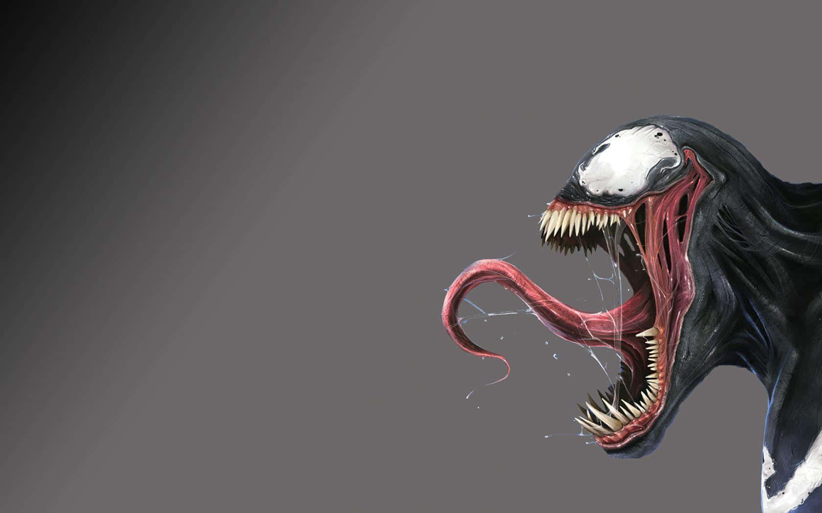 Venom Comic Book 桌布 壁紙 — 一個帶有尖牙和長舌頭的威脅性毒液生物，在深灰色漸變背景前咆哮。