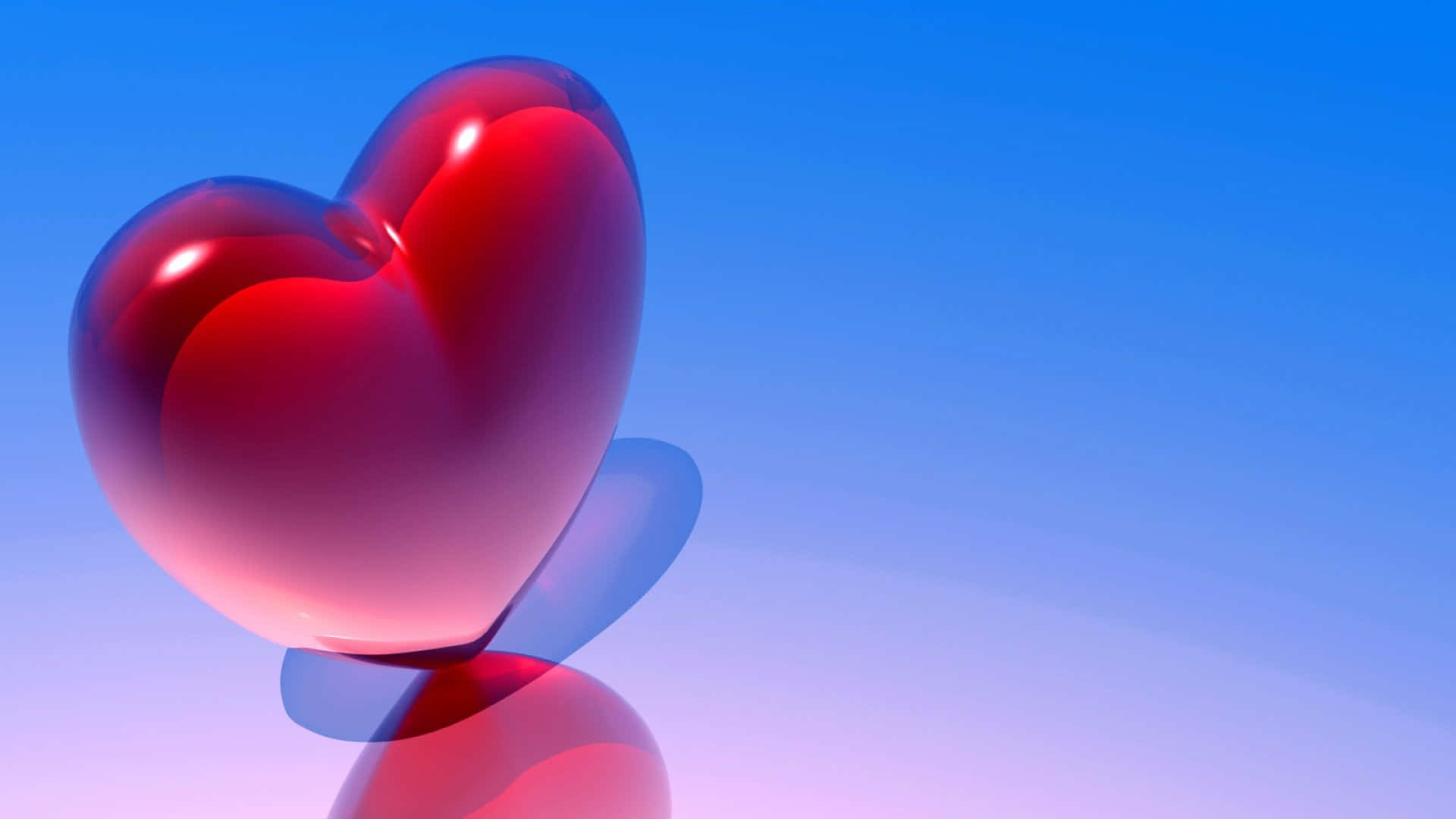 3d Heart 桌布 壁紙 — 一個帶有柔和反射的亮紅色心形物體，位於漸變藍色背景前。