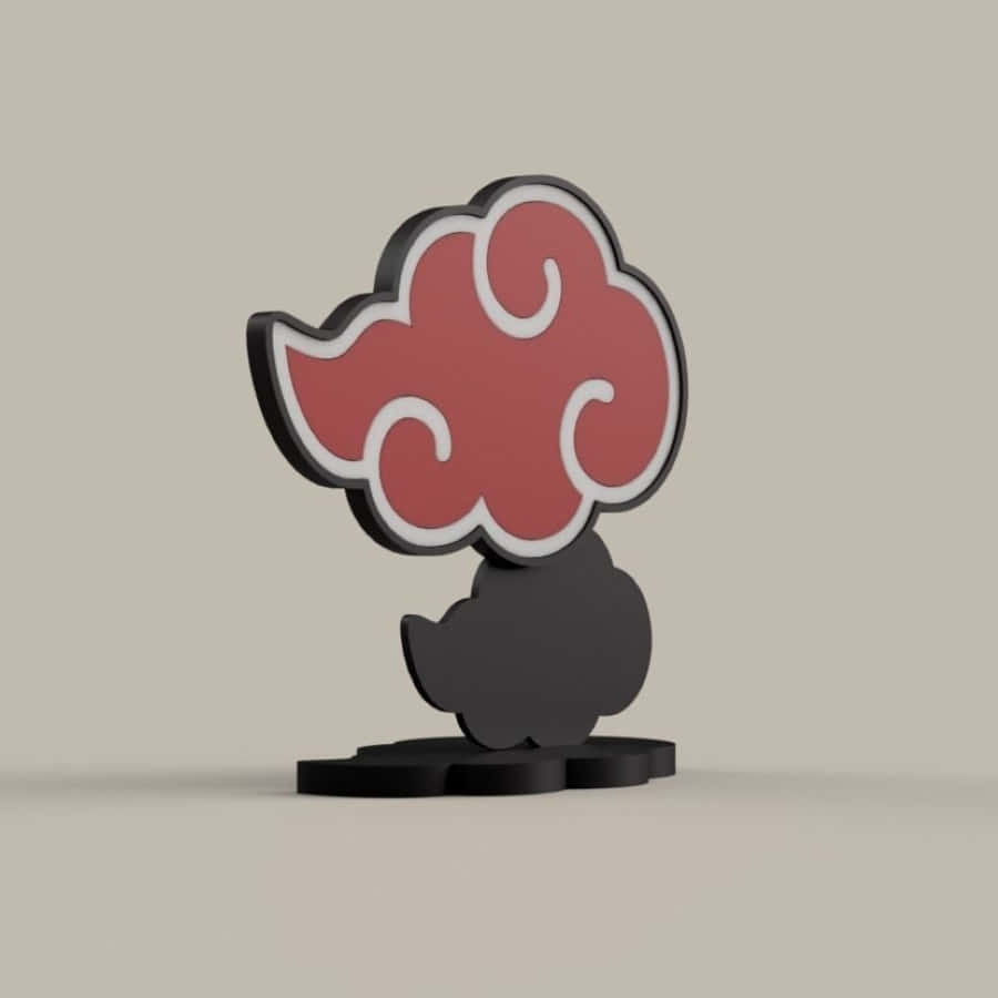 Akatsuki Symbol 桌布 壁紙 — 一個帶有白色輪廓的3D渲染紅黑雲朵符號，立在黑色底座上，背景為中性灰色。