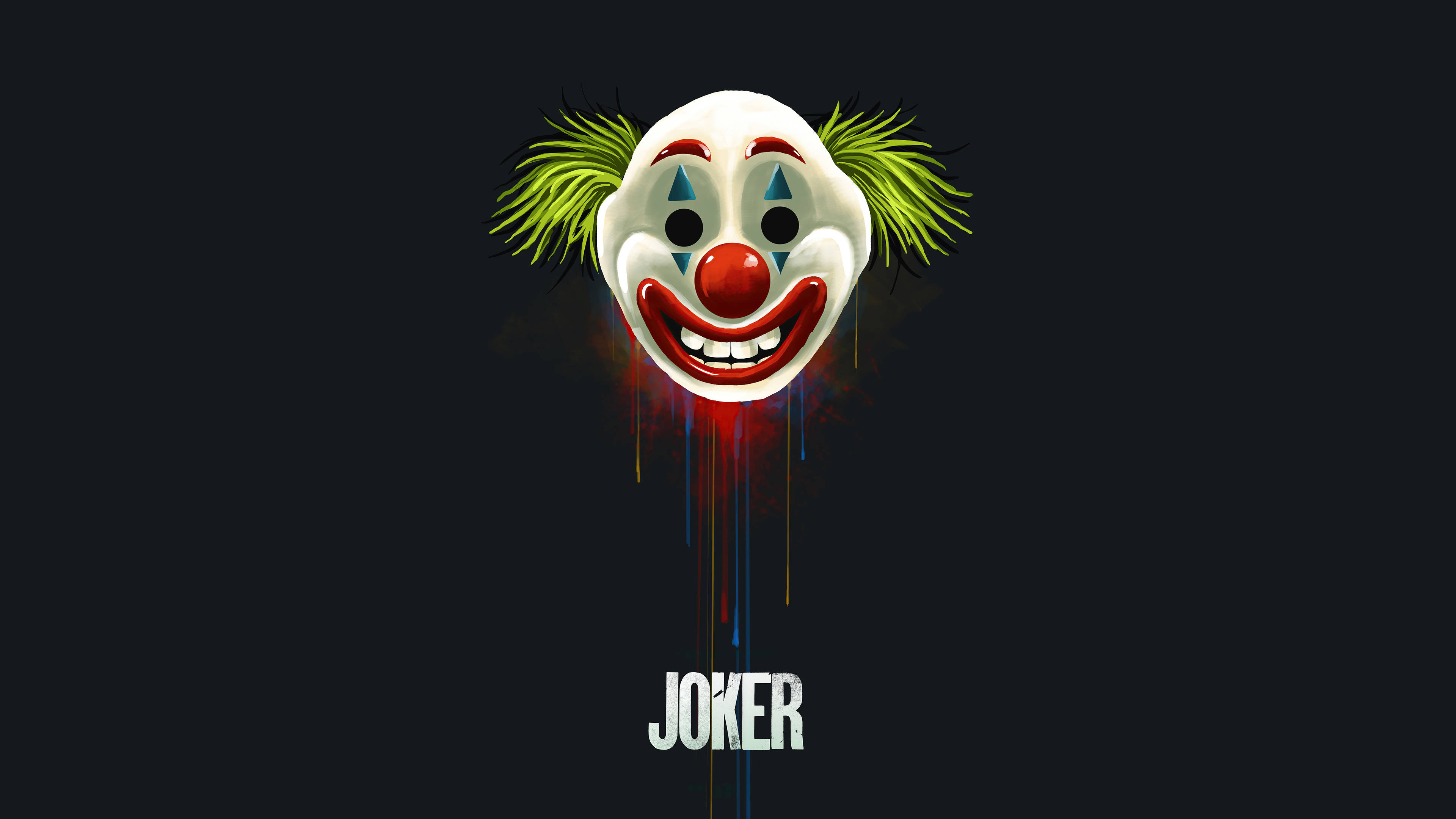 Scary Clown 桌布 壁紙 — 一個帶有綠色頭髮和紅色鼻子的威脅性小丑面具，在黑暗背景上滴落彩色油漆，下方有JOKER字樣。