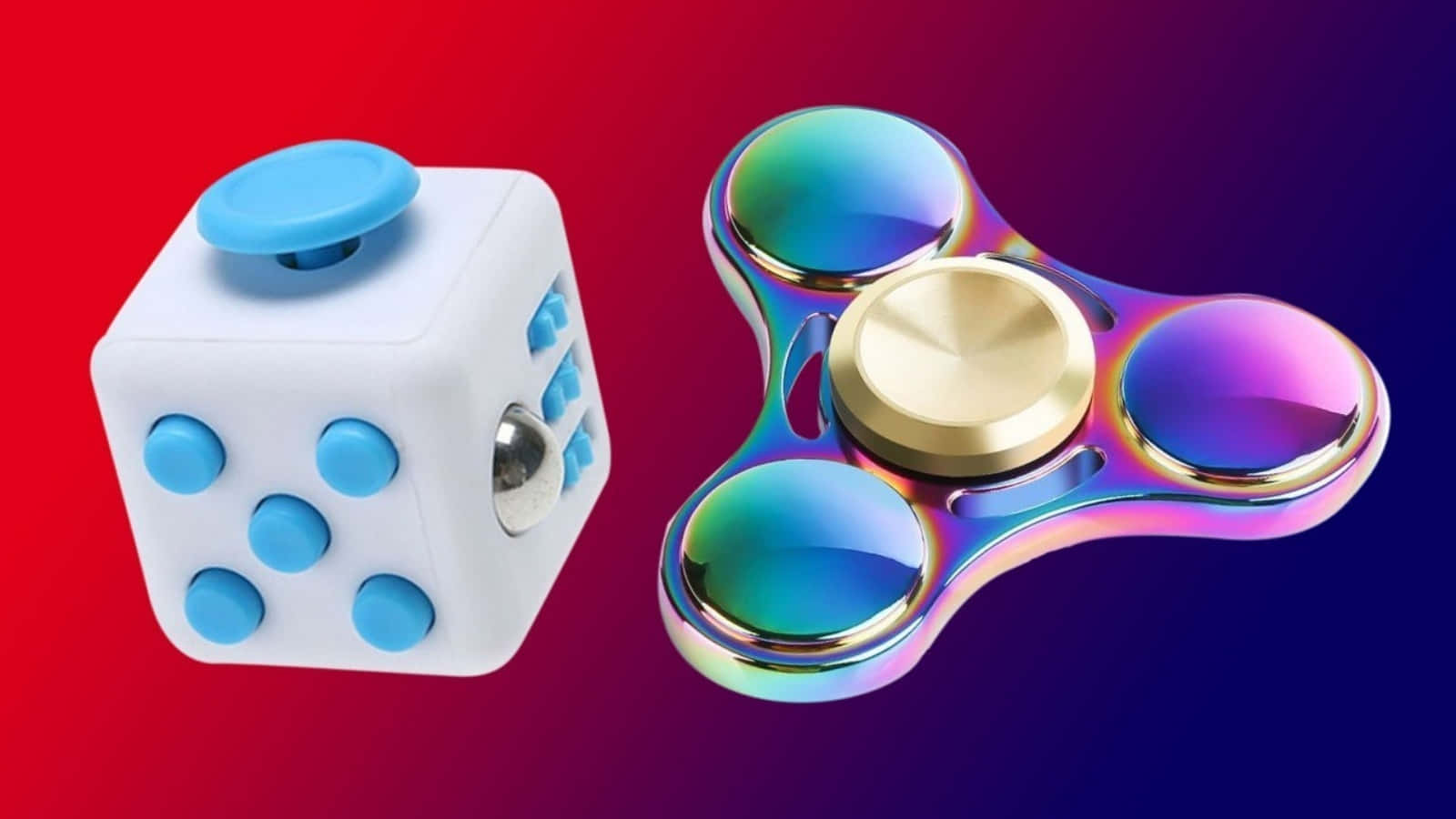 Fidget 桌布 壁紙 — 一個帶有藍色點的白色觸覺立方體和一個彩虹金屬指尖陀螺靠在充滿活力的紅到紫漸變背景上。