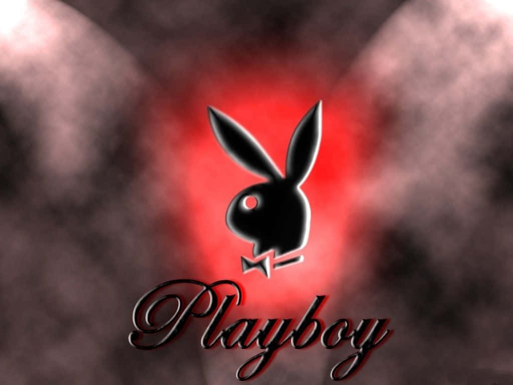 playboy 桌布 壁紙 — 一個帶有蝴蝶結的光澤黑色Playboy兔子標誌在煙霧般的紅色和灰色背景上發光。