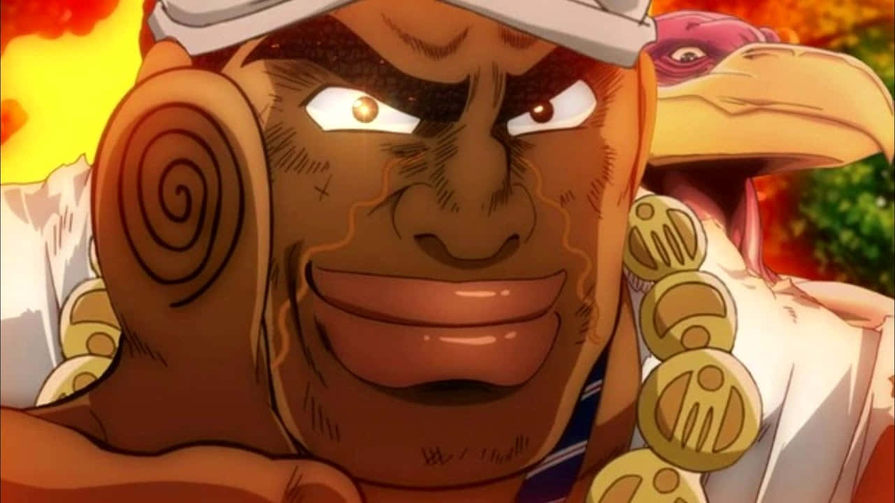 Muhammad Avdol 桌布 壁紙 — 一個帶有螺旋紋身和金獎章的兇猛動漫角色在熾熱背景下咧嘴大笑。