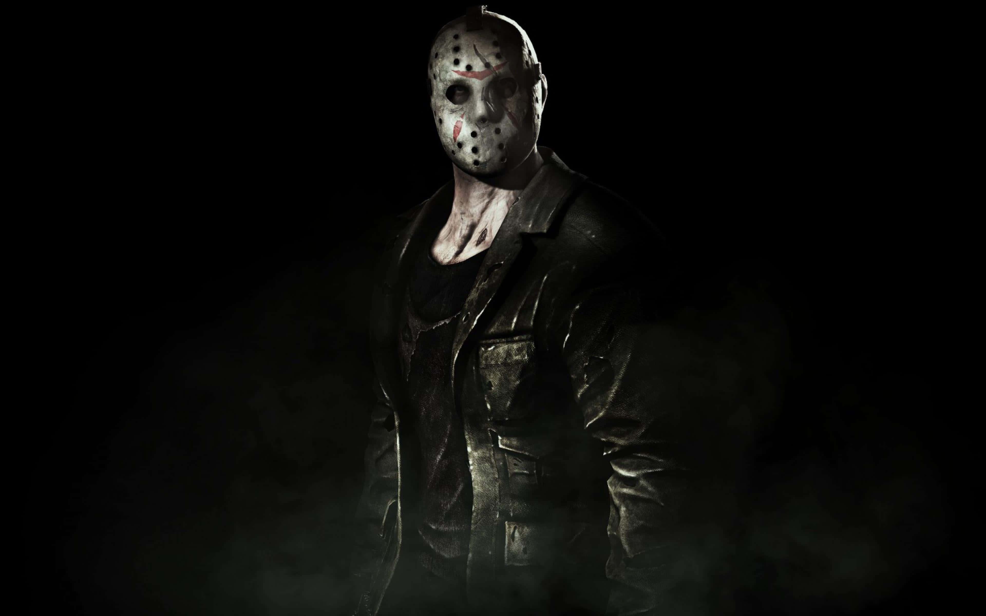 Mortal Kombat X 桌布 壁紙 — 一個帶有血跡的曲棍球面具和皮夾克的威脅人物從黑色背景的黑暗煙霧中出現。