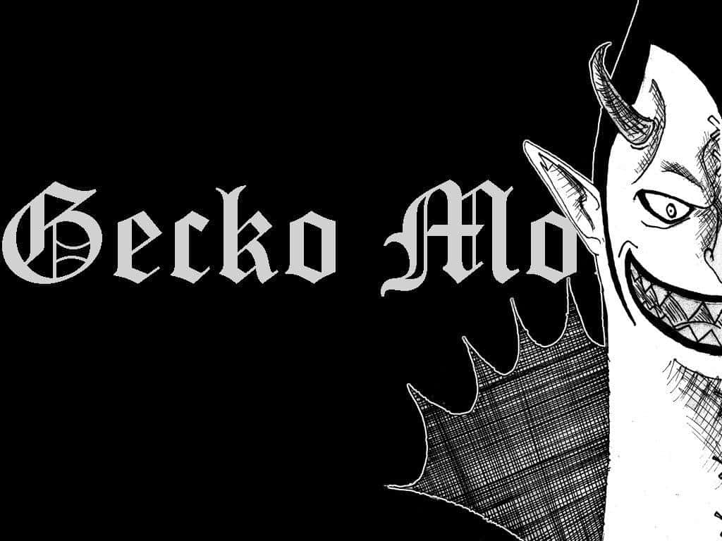 gecko moria 桌布 壁紙 — 一個帶有角和尖牙的威脅性動漫惡魔，在黑色背景上以哥德字體寫著「Gecko Moria」的文字旁邊咧嘴而笑。