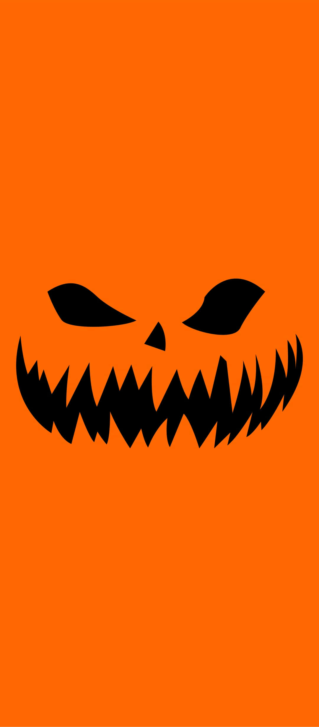 Halloween Phone 桌布 壁紙 — 一個帶有鋸齒狀牙齒和瞇起眼睛的兇惡黑色傑克南瓜燈臉孔，在純橙色背景上凝視著。