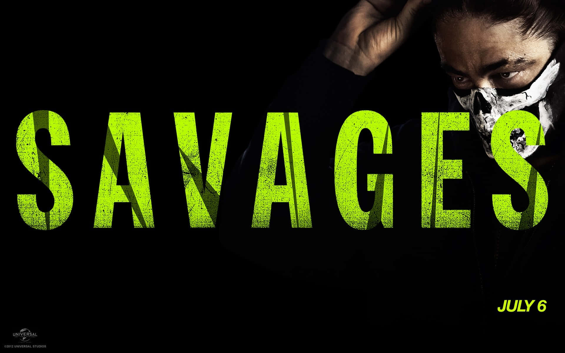 savage 桌布 壁紙 — 一個帶有骷髏面具和發光綠色標題文字的威脅性人物，背景為黑色。