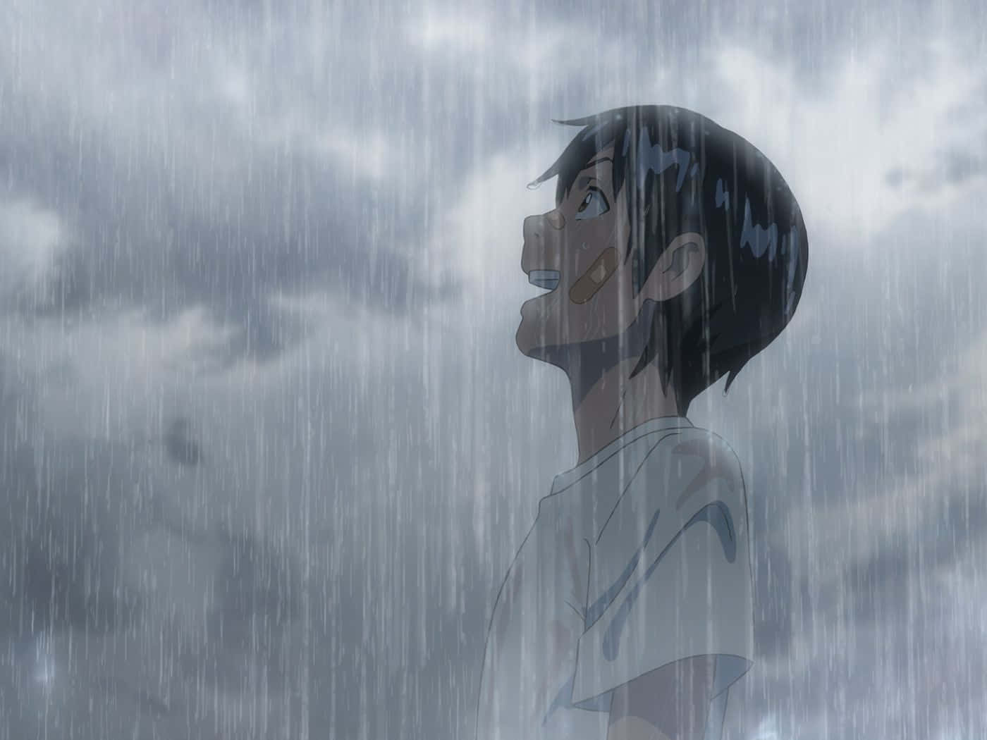 Weathering With You 桌布 壁紙 — 一個年輕的動畫男孩站在大雨中，臉上帶著喜悅的表情，水流過他的臉和濕透的襯衫。