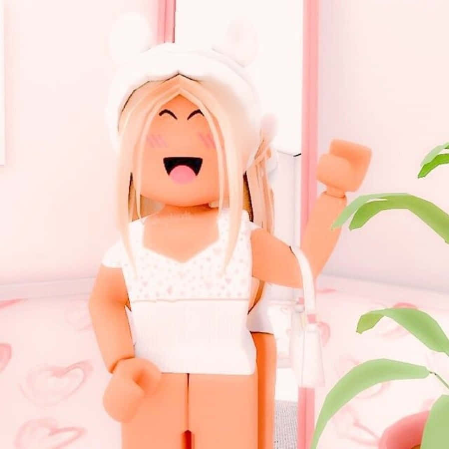 Aesthetic Roblox 桌布 壁紙 — 一個快樂的Roblox頭像，金髮，戴著白色兔子帽，在粉彩粉紅色的房間裡舉起拳頭歡呼。