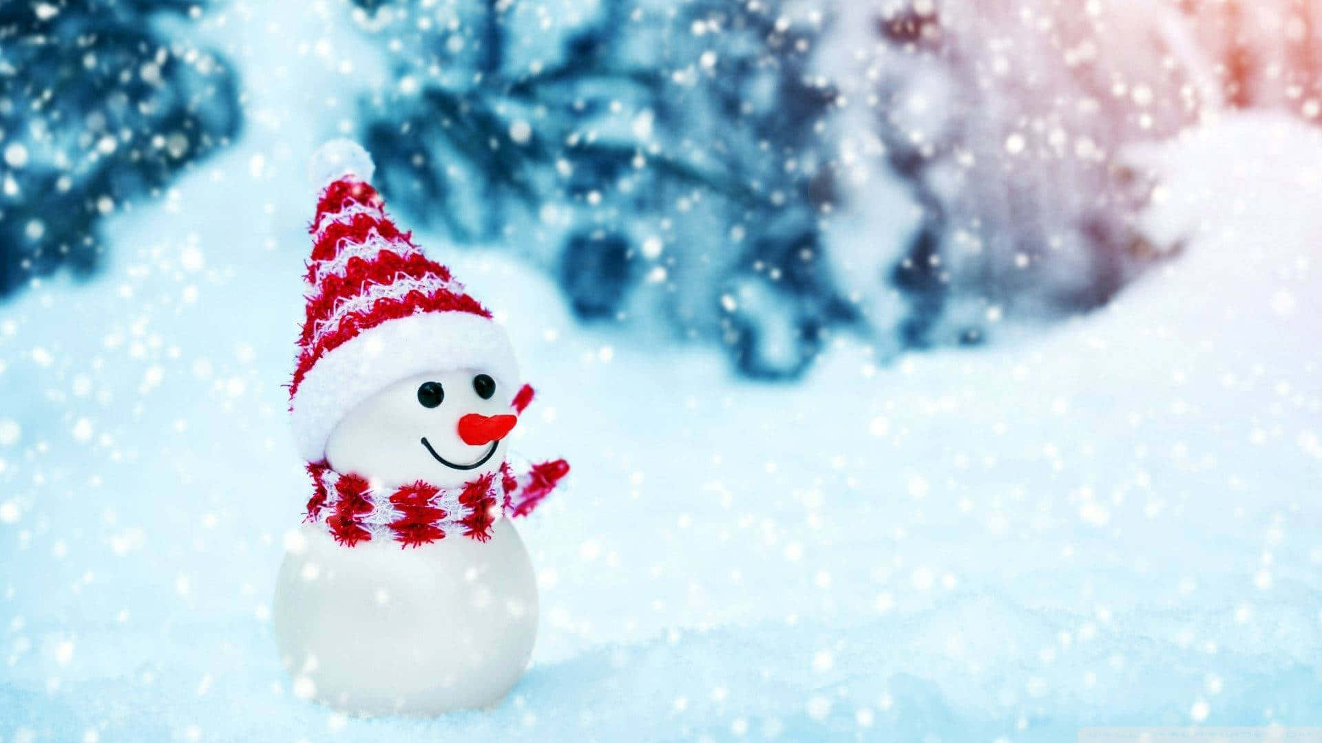 雪人 桌布 壁紙 — 一個快樂的雪人戴著紅白條紋帽子和圍巾，站在雪花飄落的雪白冬日場景中。