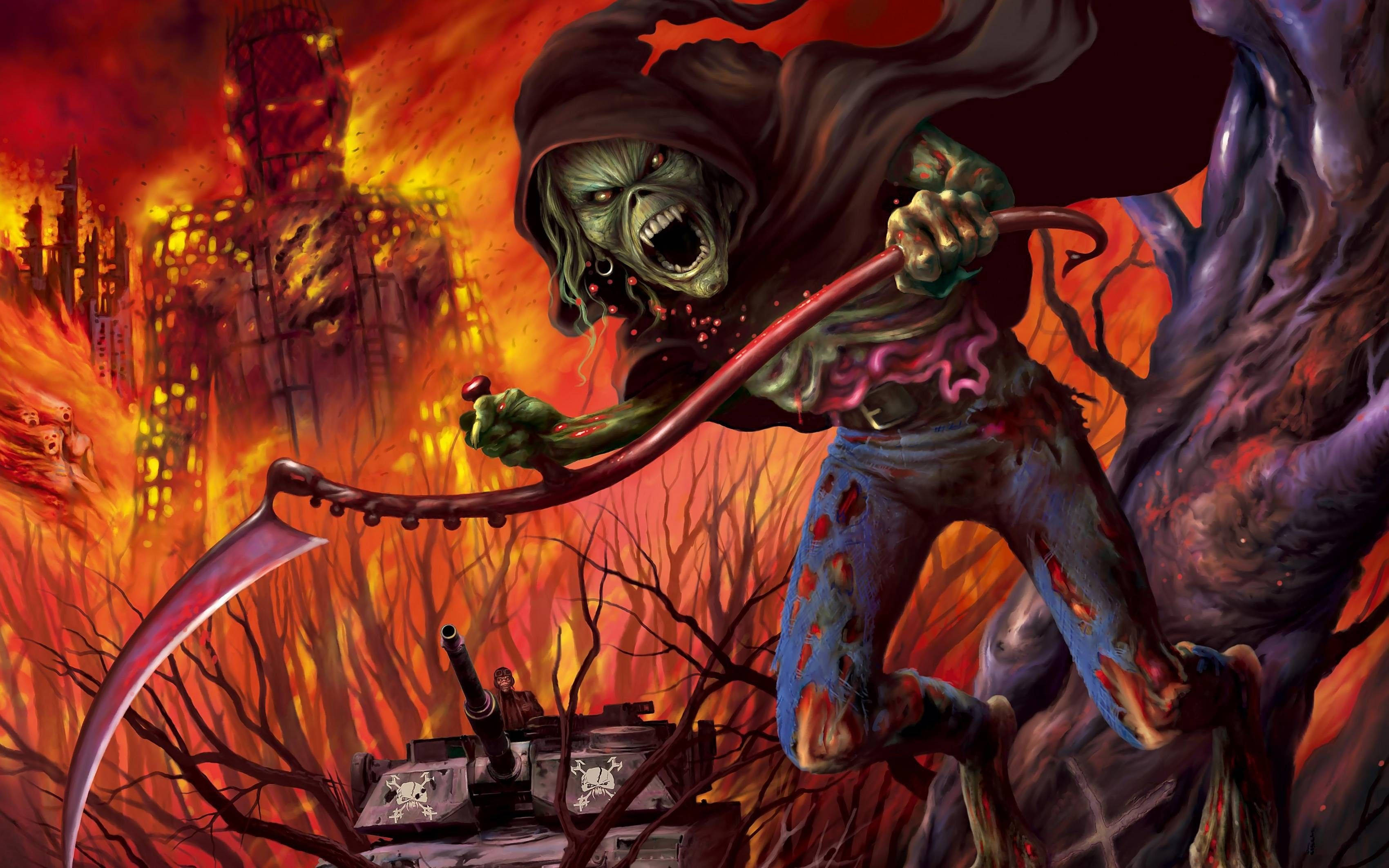 「Fear the Reaper」 壁紙 — 一個怪異的綠色死神拿著血淋淋的鐮刀，在熾熱的橙色和紅色混亂中籠罩著燃燒的城市景觀。