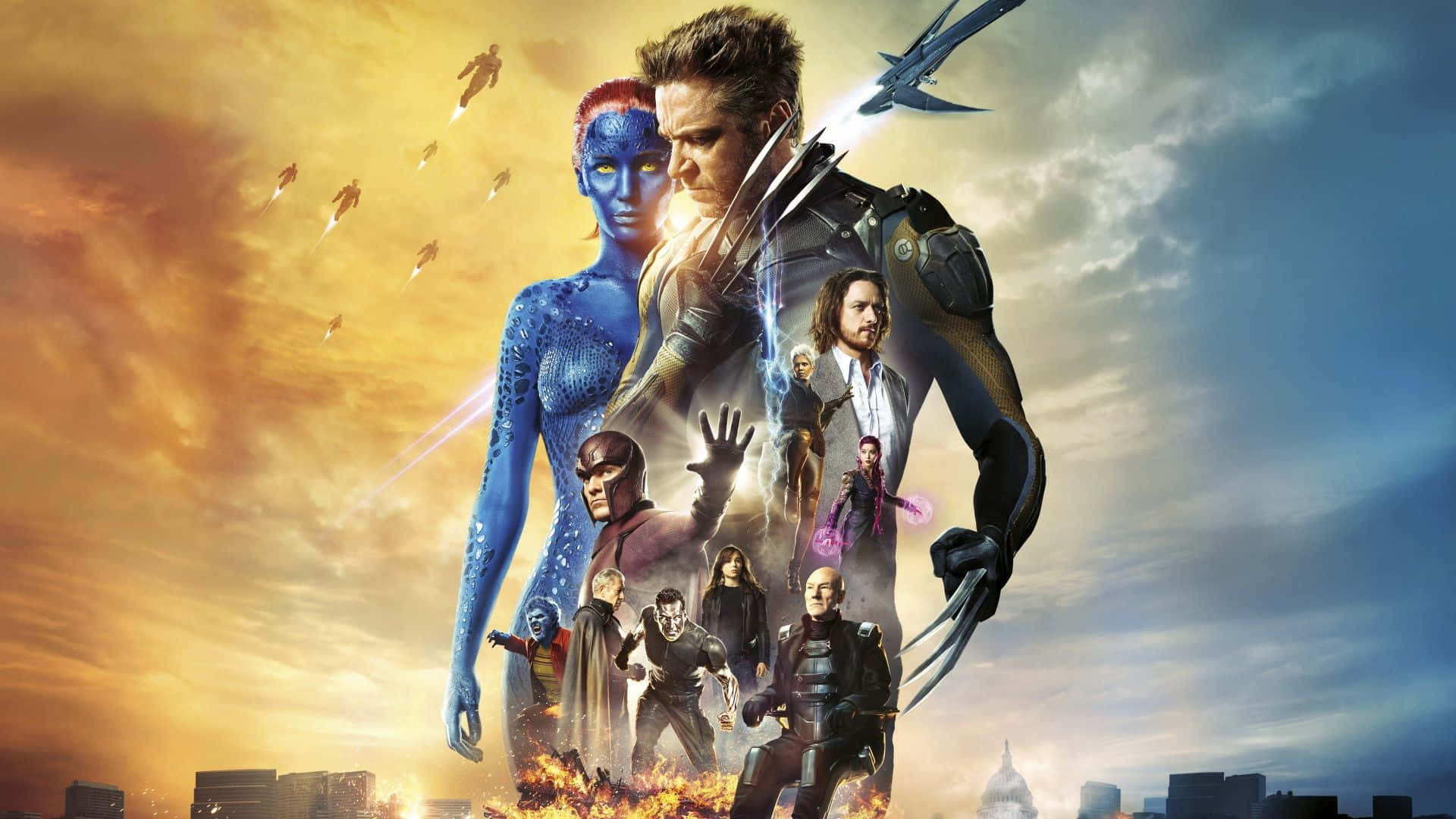 Action Movie 桌布 壁紙 — 一個戲劇性的超級英雄組合站在熾熱的日落天空前，下方有飛行人物和城市景觀。
