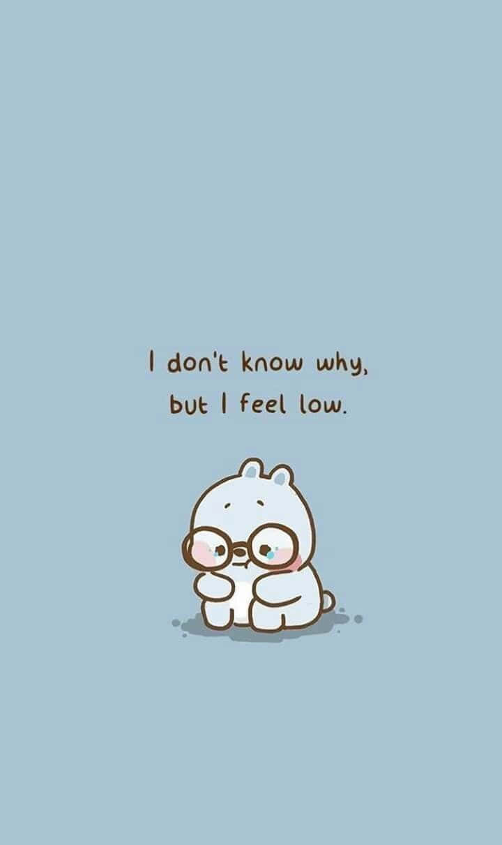 一個戴眼鏡嘅卡通角色，寫住「I don't know why but I feel low」 壁紙