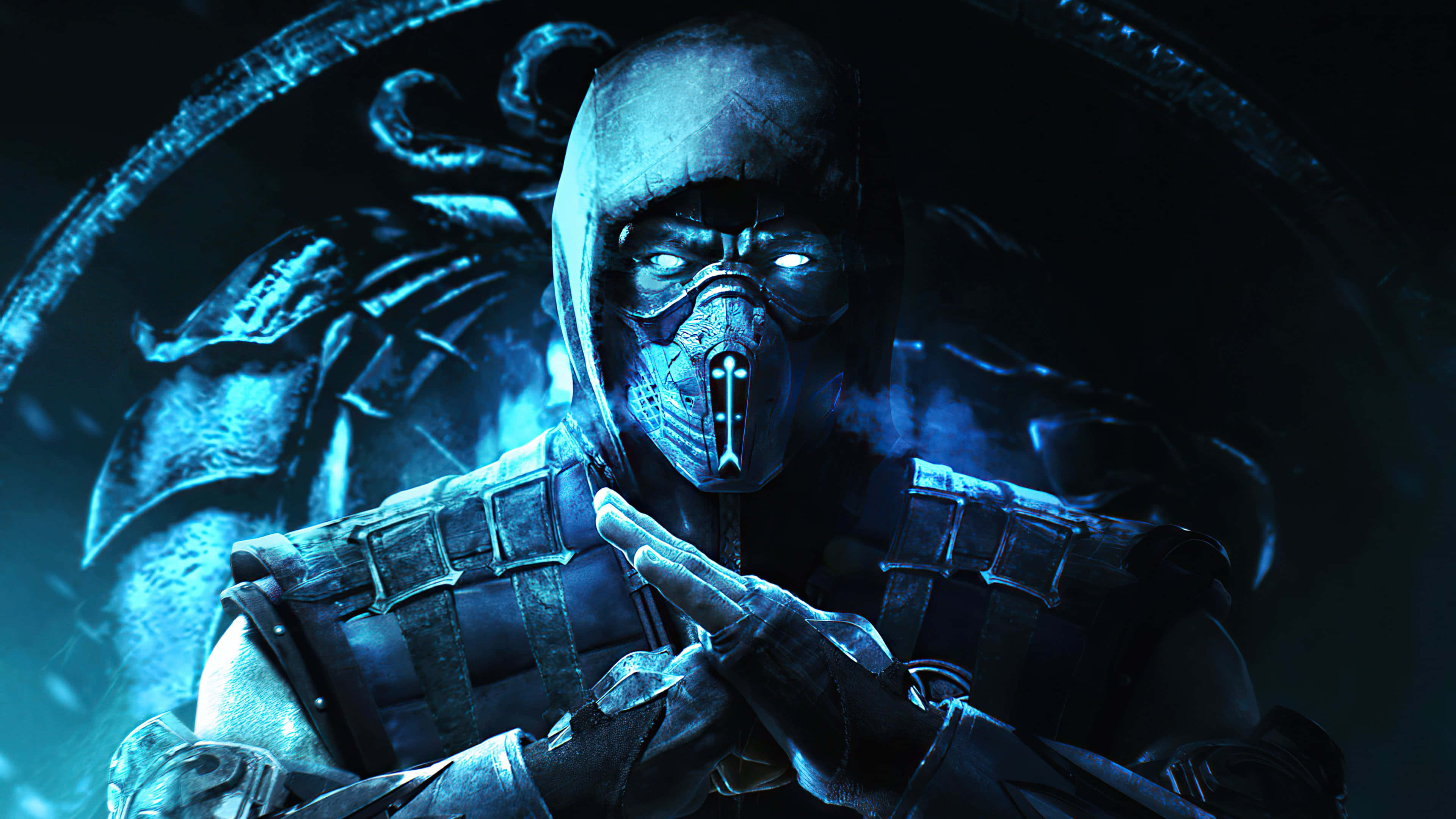 Mortal Kombat Sub-zero 桌布 壁紙 — 一個戴著兜帽、眼神發光、戴著面具的威脅性戰士，站在深藍色燈光的環境中，做出手勢。