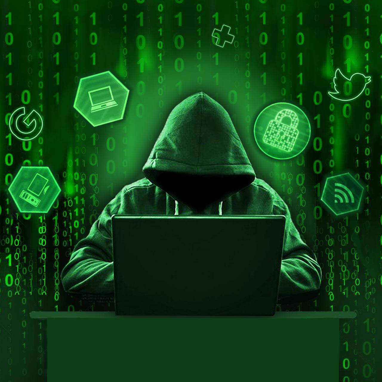 Hacking 桌布 壁紙 — 一個戴著兜帽的人坐在手提電腦前，被發光的綠色數位符號和落下的二進位代碼包圍。