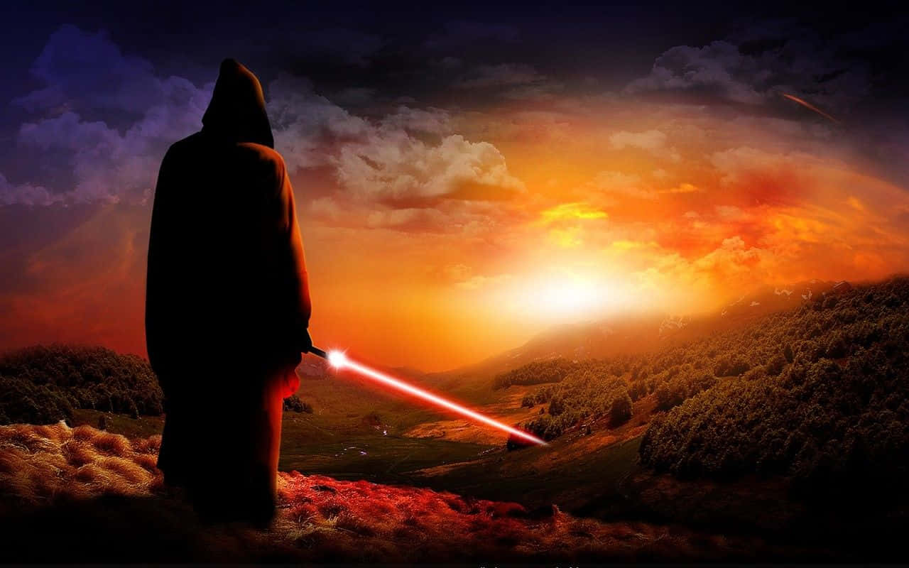 Cool Star Wars 桌布 壁紙 — 一個戴著兜帽的身影站在日落時分的山丘上，手持紅色光劍，背景是火熱的橙色和紫色天空。