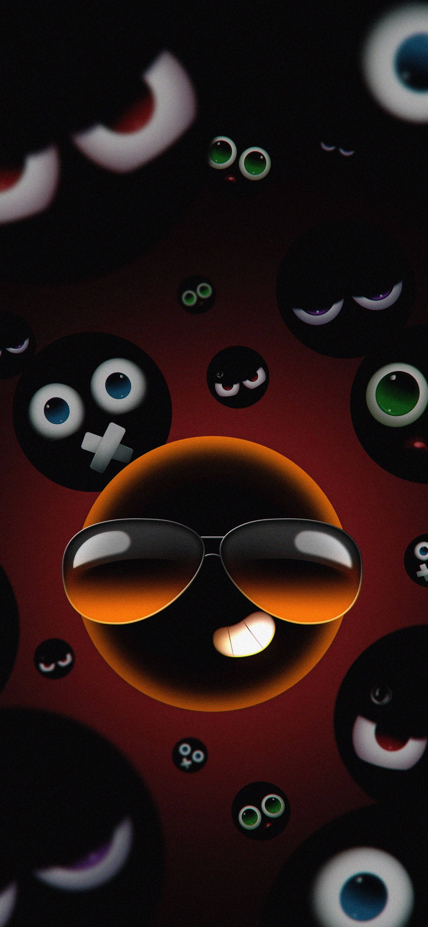 Black Emoji 桌布 壁紙 — 一個戴著太陽眼鏡的酷炫黑色球體，在深紅色背景上被漂浮的卡通眼睛包圍，對著觀眾微笑。