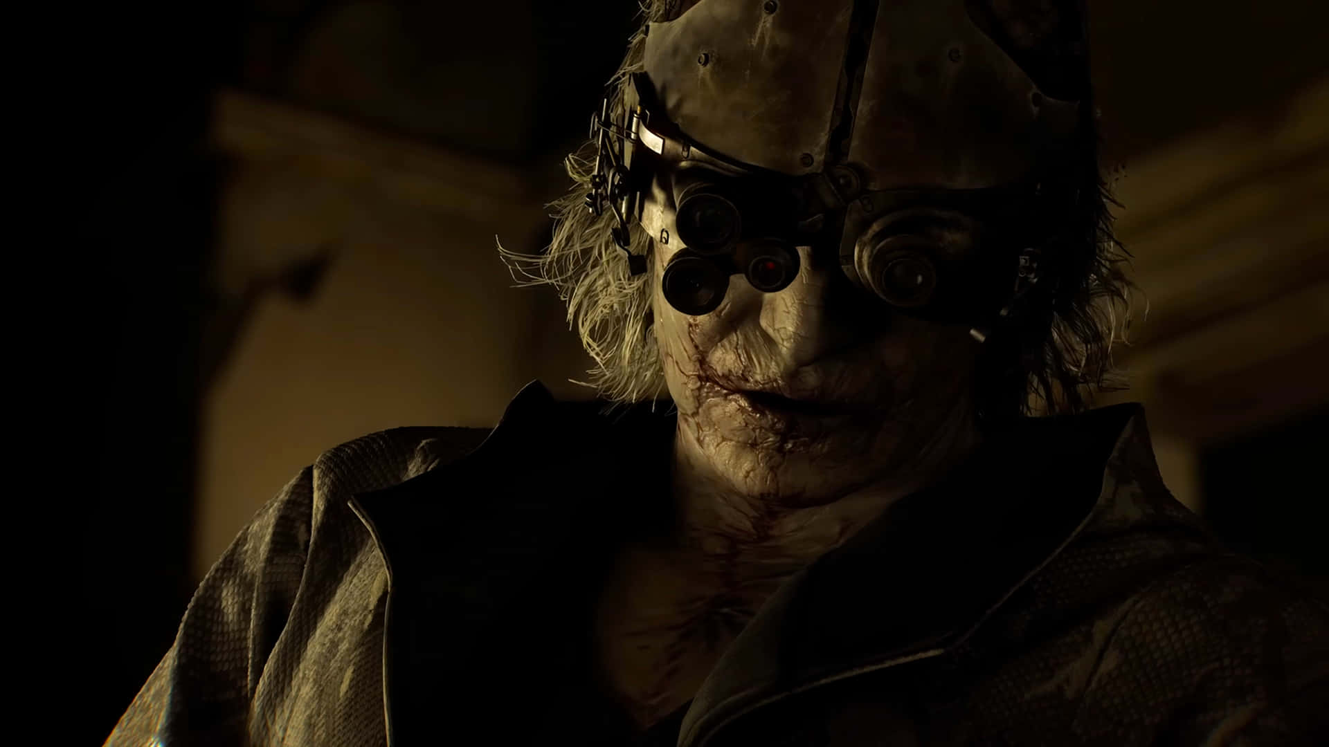 Resident Evil Requiem Victor Gideon 壁紙 — 一個戴著怪異面具、機械護目鏡、滿臉鮮血的人物在昏暗燈光下的特寫。