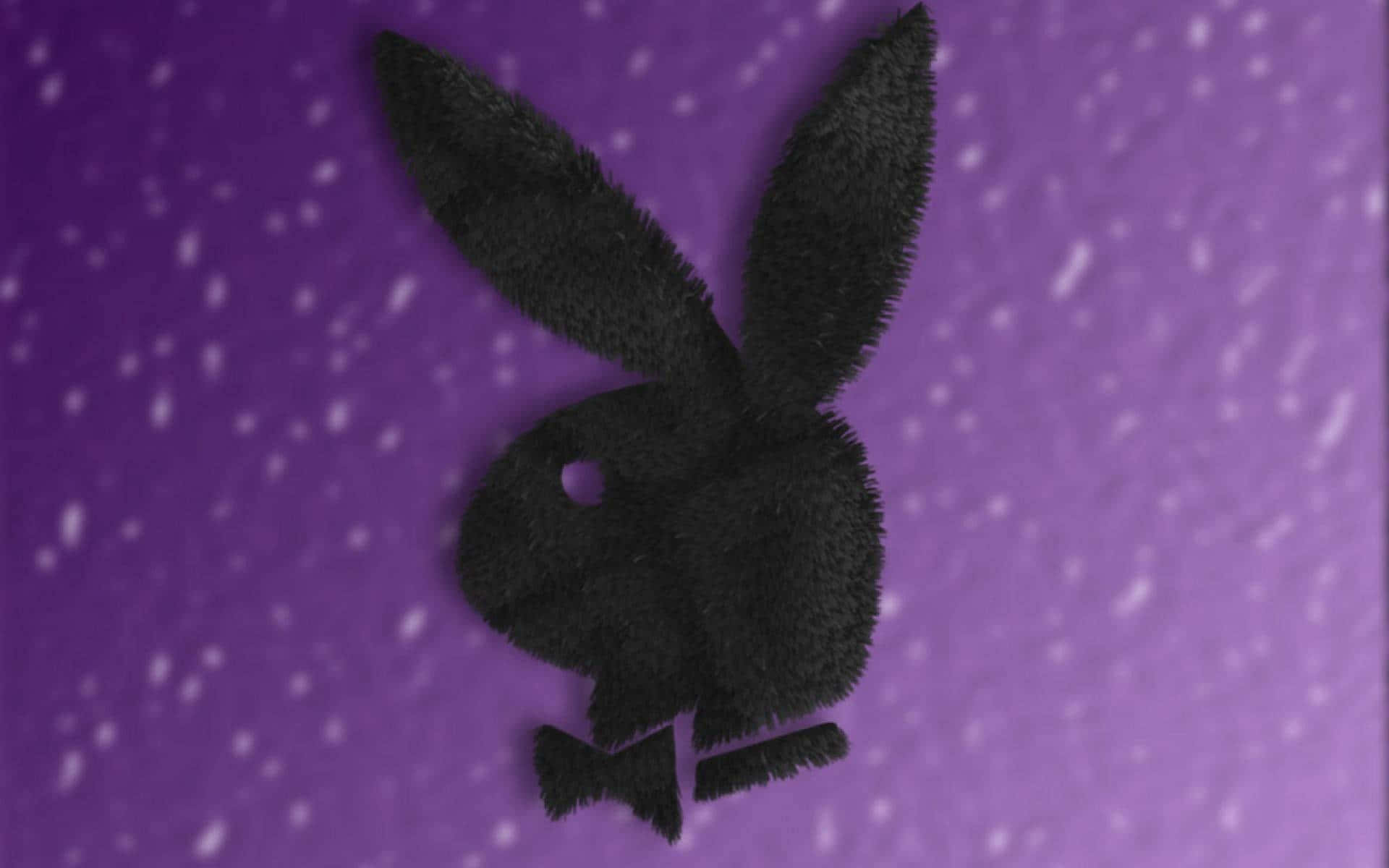 Playboy Aesthetic 桌布 壁紙 — 一個戴著蝴蝶結的黑色毛絨兔標誌在斑點紫色背景上格外突出。
