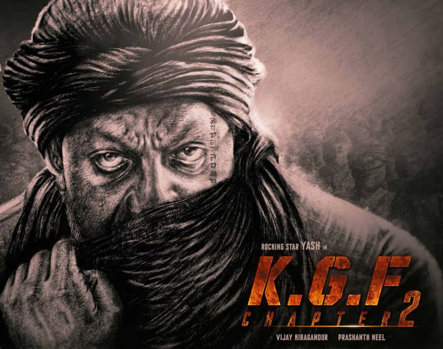 Kgf Chapter 2 桌布 壁紙 — 一個戴著頭巾和圍巾遮住嘴巴的男人，臉上帶有疤痕和紋身，眼神強烈地凝視著鏡頭。