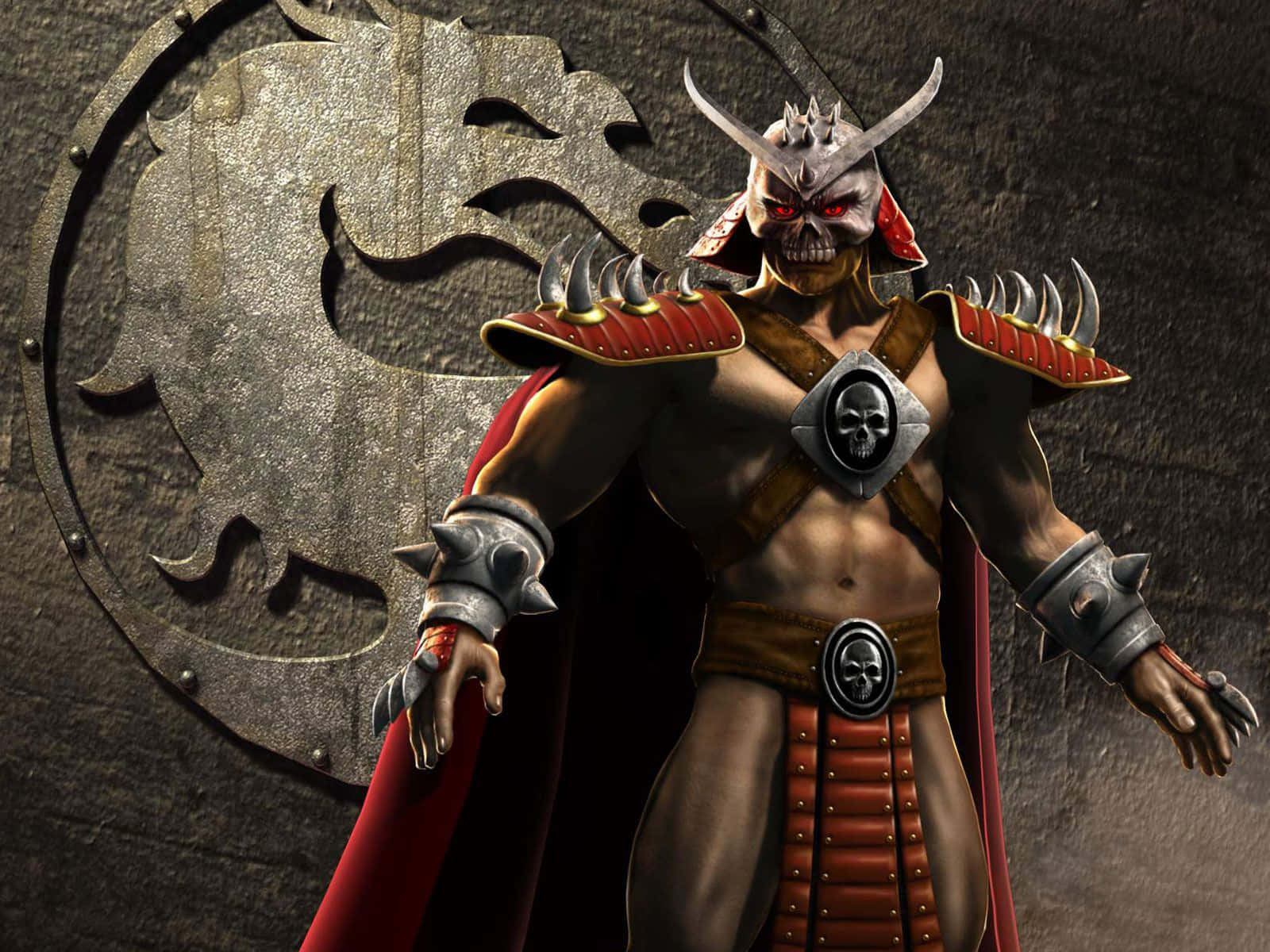 Mortal Kombat Goro 桌布 壁紙 — 一個戴著骷髏面具和紅色斗篷的威嚇裝甲戰士，站在石牆上金屬龍徽章前。