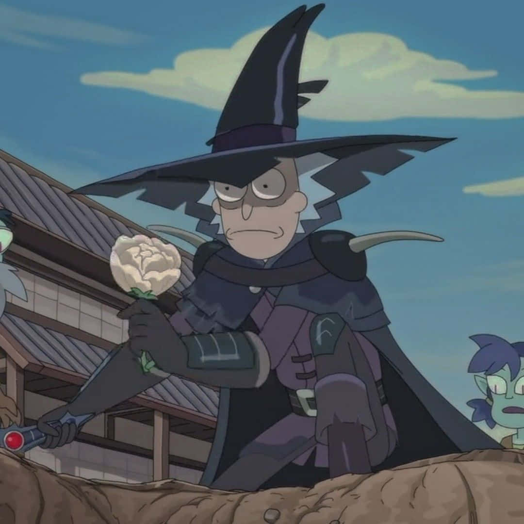 Total Rickall 桌布 壁紙 — 一個戴著高帽、脾氣暴躁的動畫女巫站在屋頂上，身後有一座傳統建築，手持一朵白玫瑰。