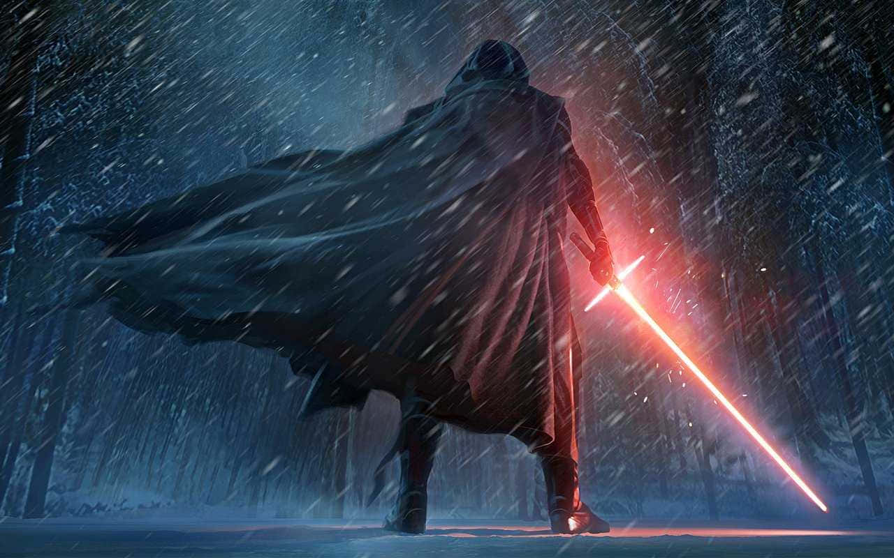 Cool Star Wars 桌布 壁紙 — 一個披著斗篷的身影站在雪地森林中，揮舞著發光的紅色光劍，雪花在周圍飄落。