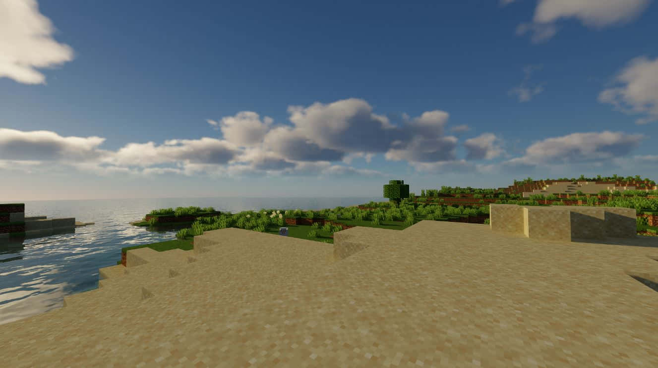 Minecraft Survival 桌布 壁紙 — 一個方塊狀嘅Minecraft景觀，有沙灘、綠色山丘同海洋，上面係晴朗嘅藍天同 fluffy 雲。