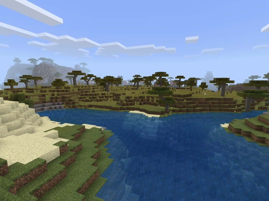 Minecraft Bedrock Edition 桌布 壁紙 — 一個方塊狀嘅Minecraft風景，藍色河流流過草地山丘同樹木，天空晴朗。