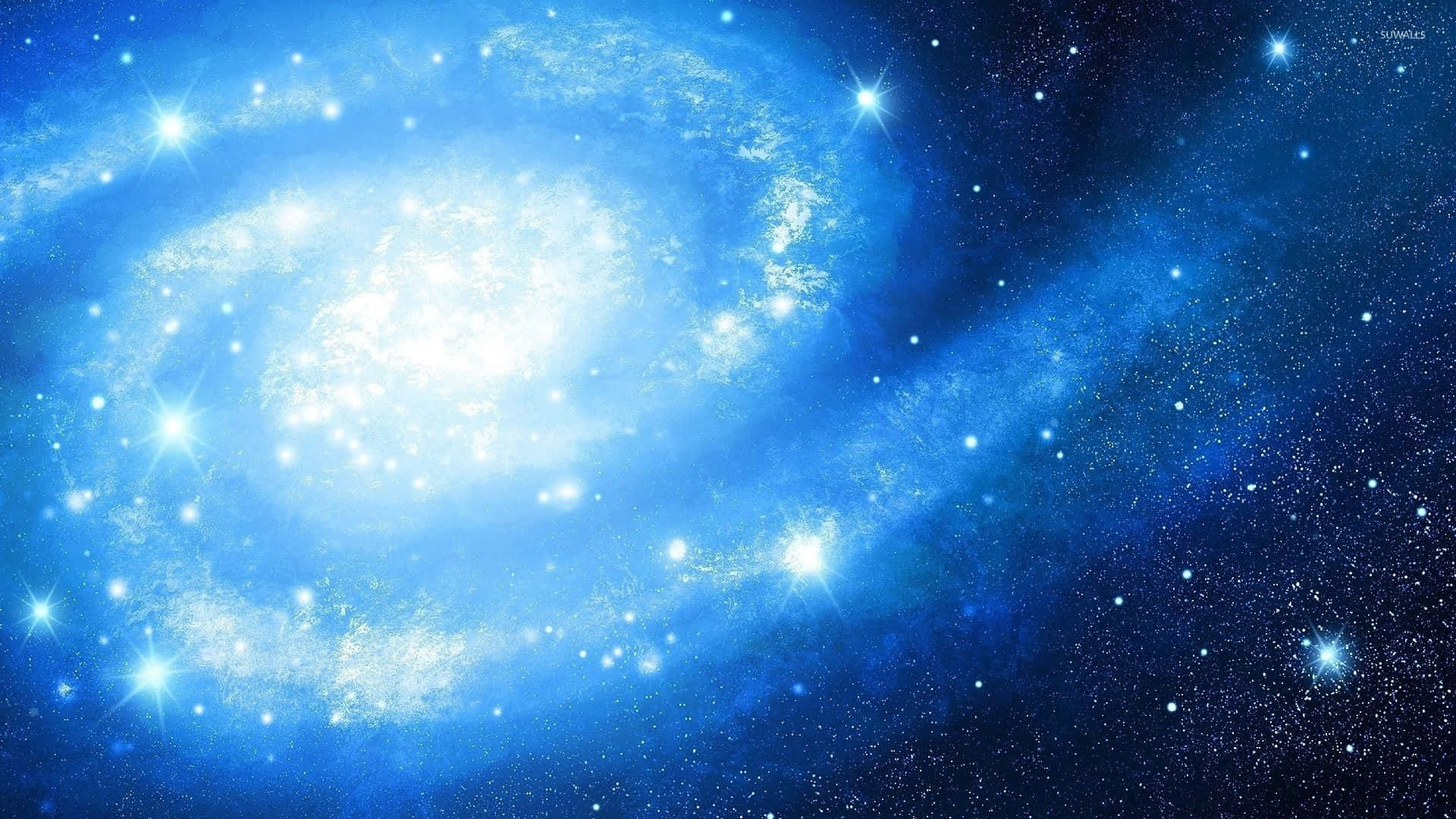 Beautiful Space 桌布 壁紙 — 一個明亮的藍色螺旋星系在深邃的宇宙背景下散發出燦爛的星光。