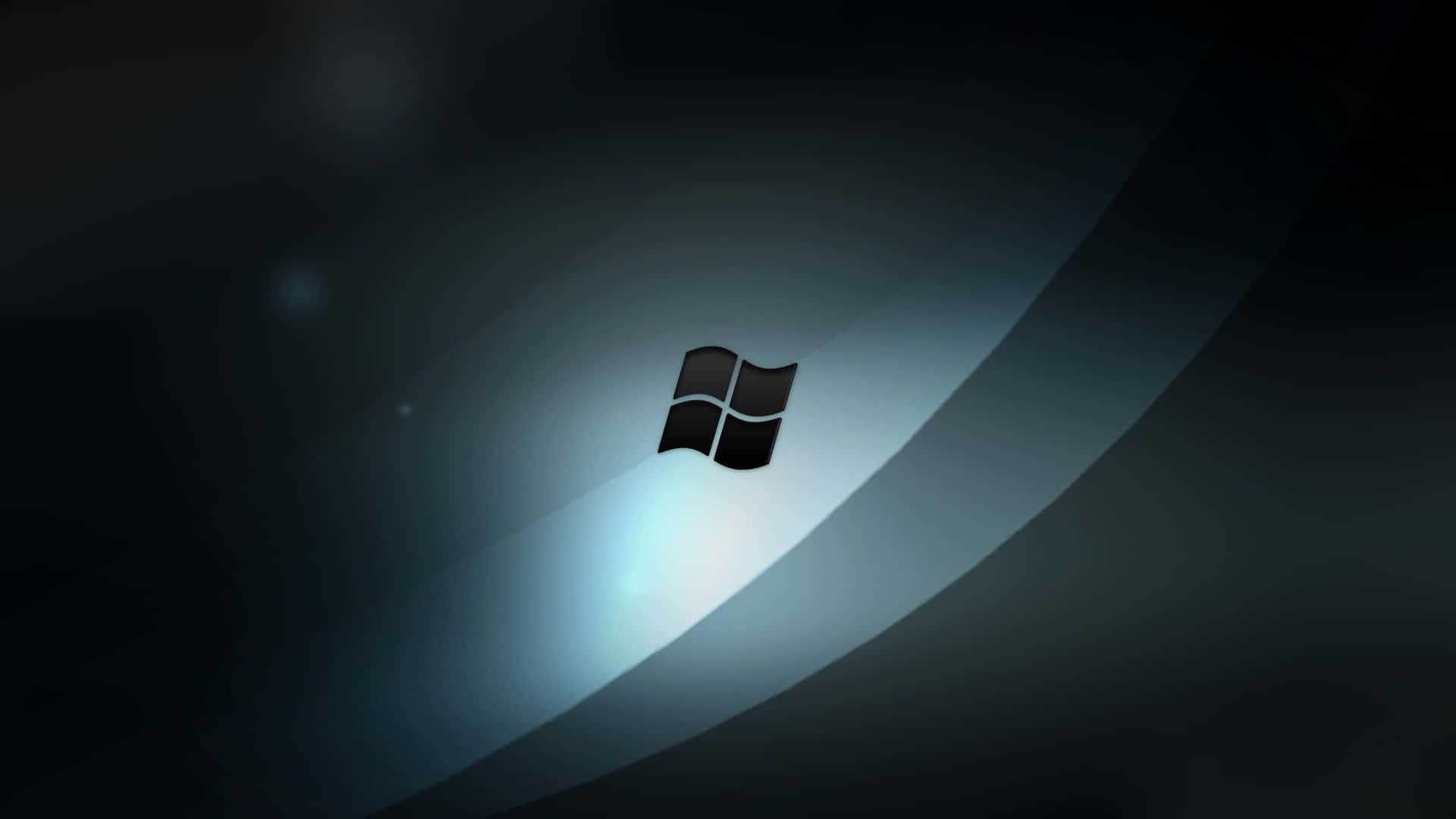 Black Windows 桌布 壁紙 — 一個時尚的Windows標誌在帶有微妙光線條紋的深色漸變背景上柔和地發光。