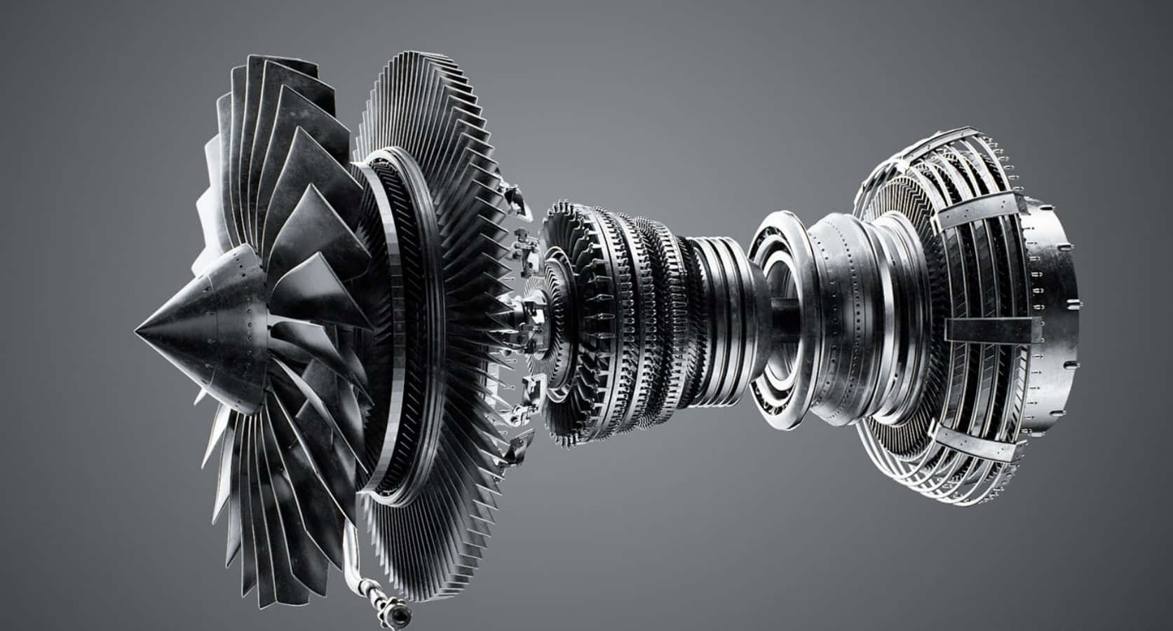 Jet Engine 桌布 壁紙 — 一個時尚的金屬噴射引擎剖面圖，在灰色中性背景上展現複雜的渦輪葉片和燃燒室。