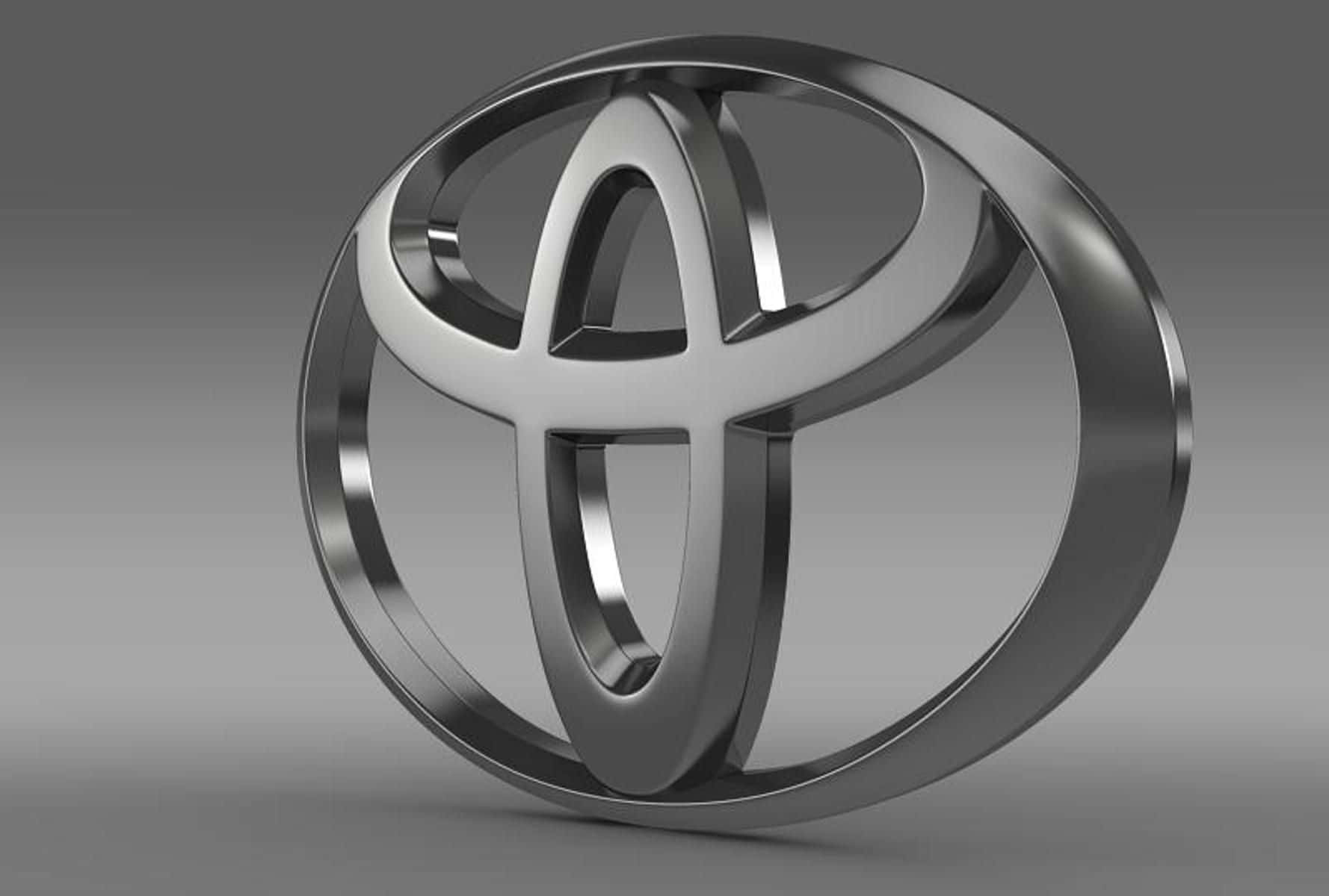 Toyota 桌布 壁紙 — 一個時尚的金屬豐田標誌，以3D渲染，帶有反射表面，背景為漸變灰色。