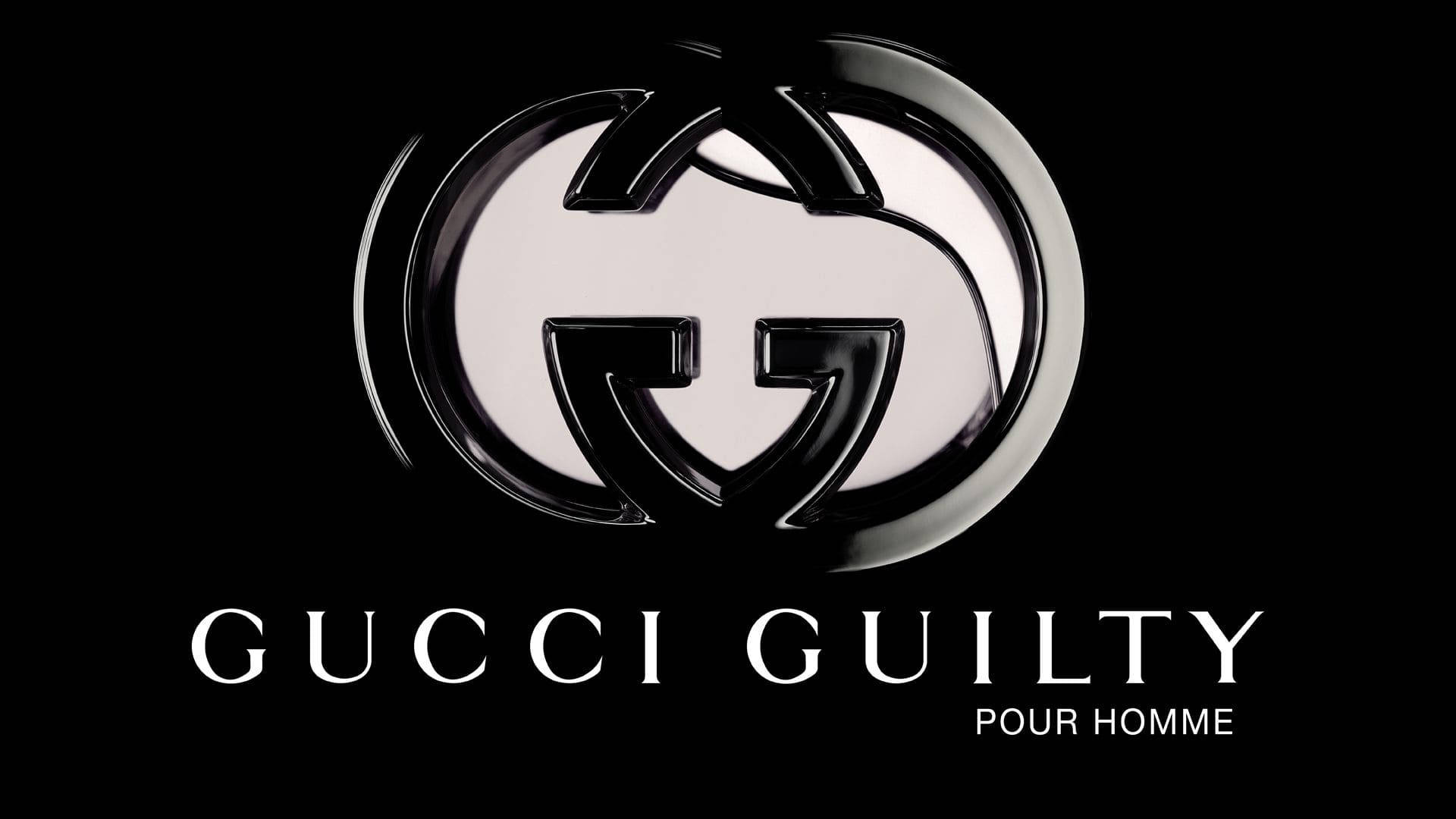 Gucci 桌布 壁紙 — 一個時尚的黑色和銀色 Gucci Guilty Pour Homme 標誌在純黑色背景上閃耀，下方有粗體白色文字。