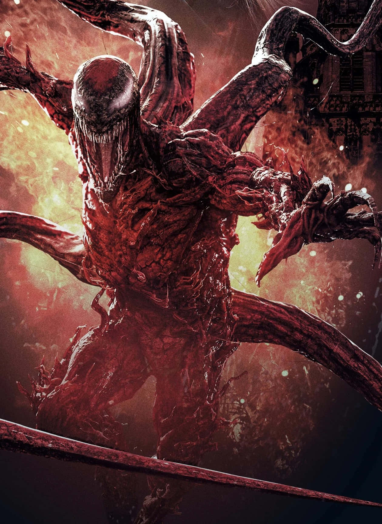 Maximum Carnage 桌布 壁紙 — 一個有多條肢體和尖銳牙齒的威脅性紅色共生生物，在熾熱的橙色和黑色背景上咆哮。