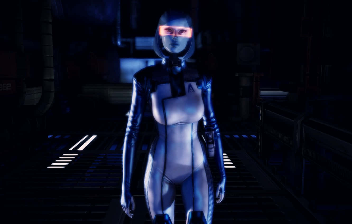 Mass Effect Edi 桌布 壁紙 — 一個未來感女性機械人，身穿時尚藍色套裝，站在燈光昏暗、地板發光的科幻走廊中。