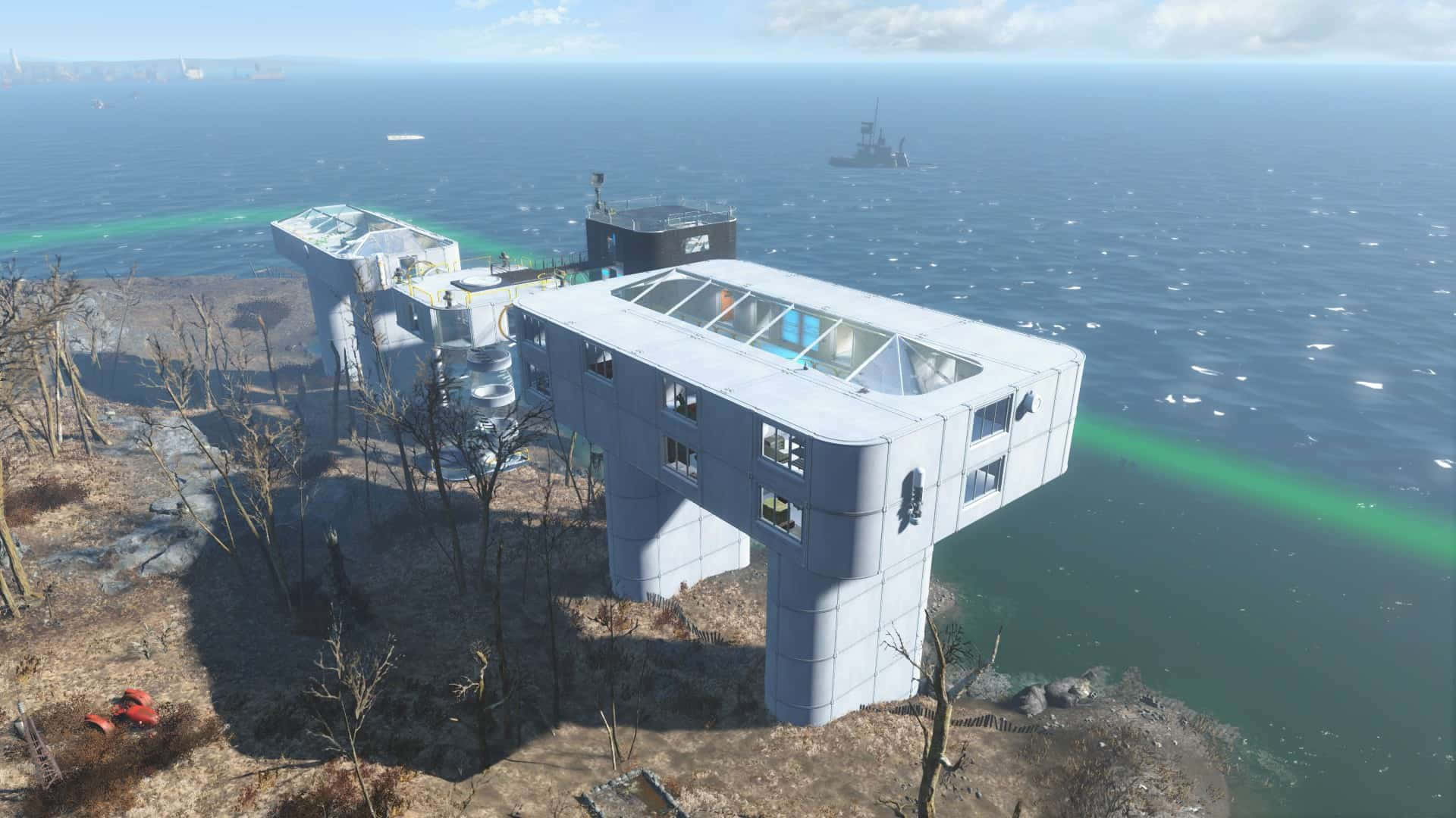 Fallout 4 Institute 桌布 壁紙 — 一個未來風格的浮動模塊化建築群，坐落在荒蕪的海岸懸崖上，俯瞰著廣闊的海洋，海上有船隻和發光的綠色水紋。