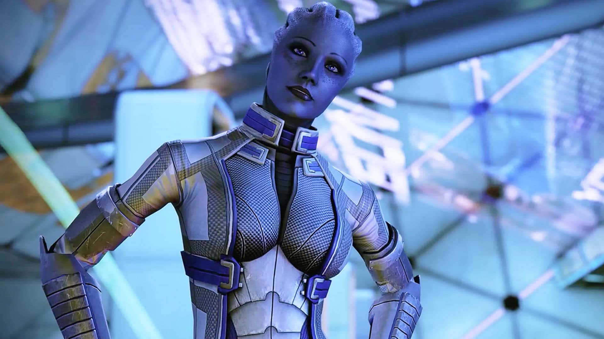 質量效應 桌布 壁紙 — 一個未來風格的藍皮膚外星女性穿著精細的裝甲服，自信地站在高科技科幻環境中。