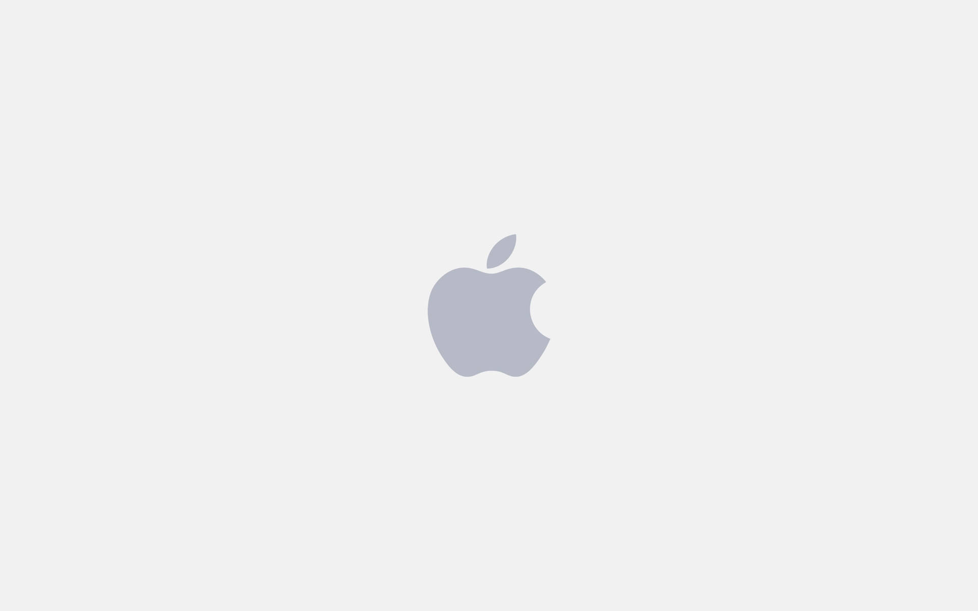  壁紙 — 一個極簡灰色Apple標誌居中在純淺灰色背景上。